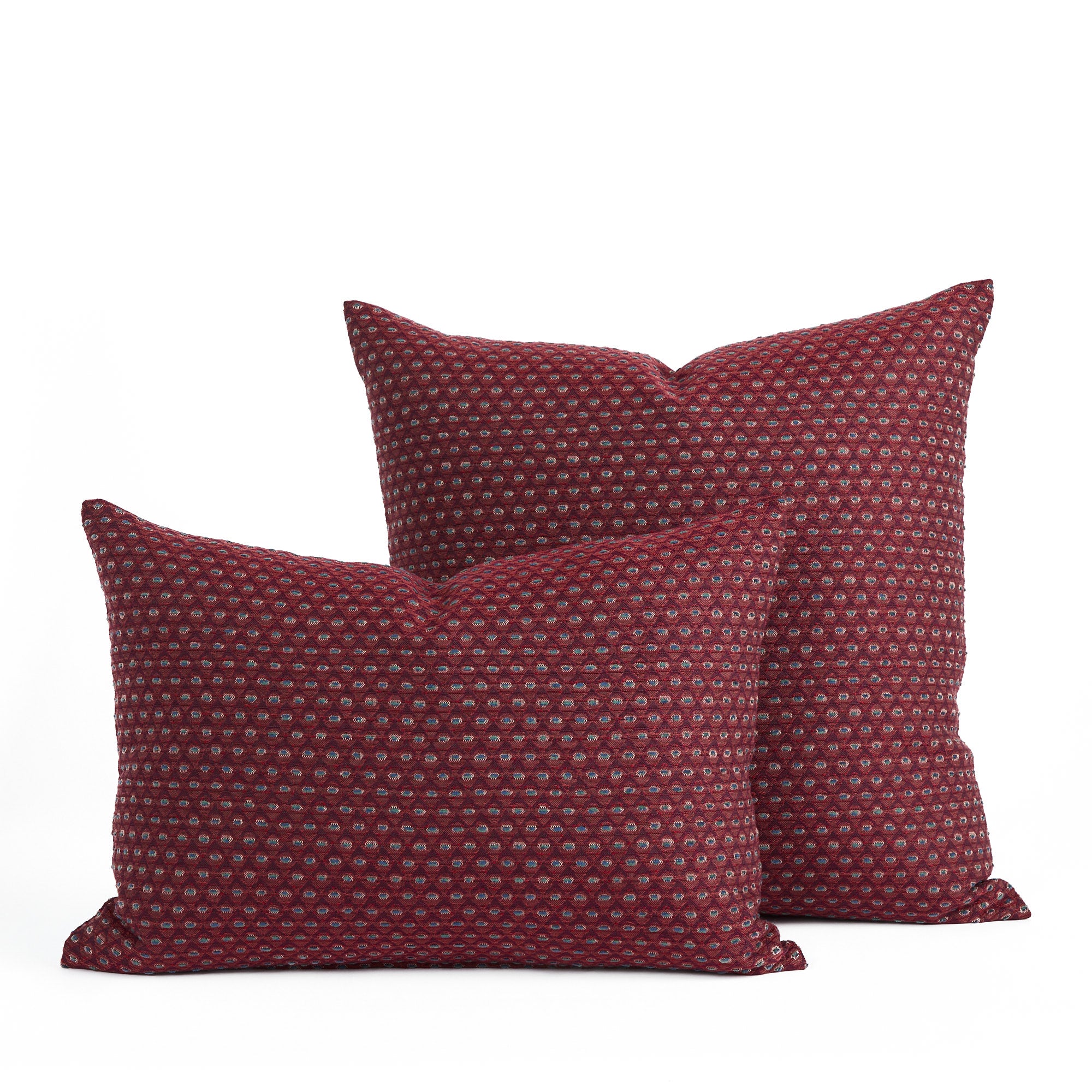 Pembrook 14x20 lumbar pillow in burgundy stacked with matching 20x20 toss pillow, Tonic Living.