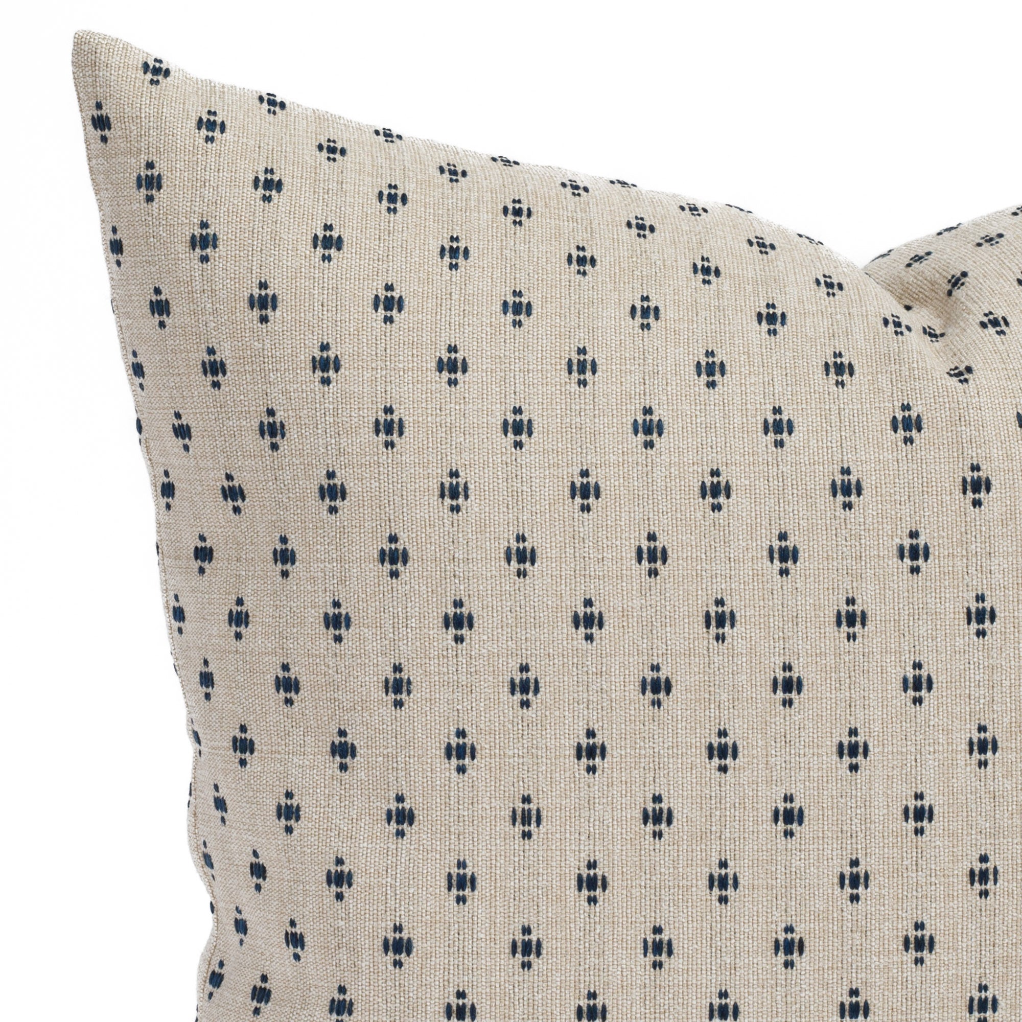 Pierce Navy, a taupe and dark blue pillow with a preppy traditional pattern: close up view.