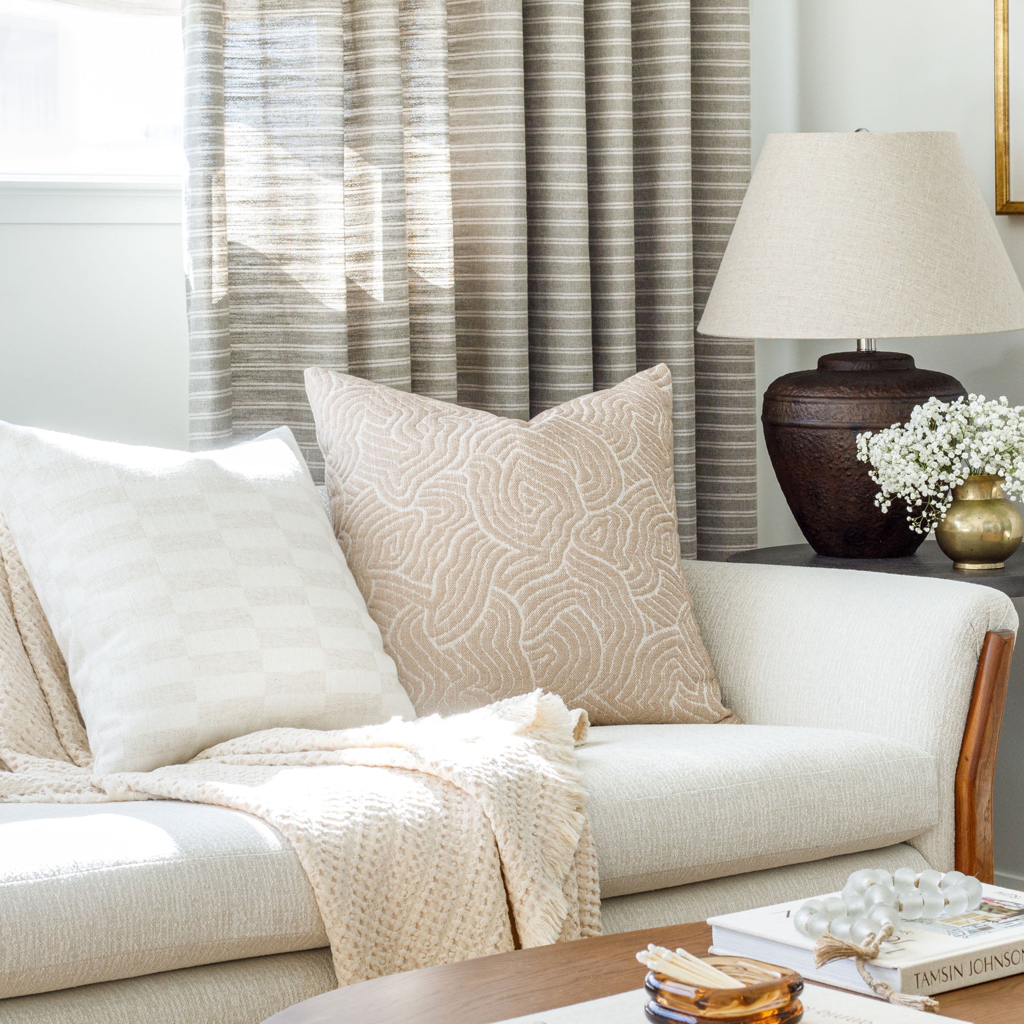 Modern designer Tonic Living throw pillows : Quince Petal Pink and Webster Buff