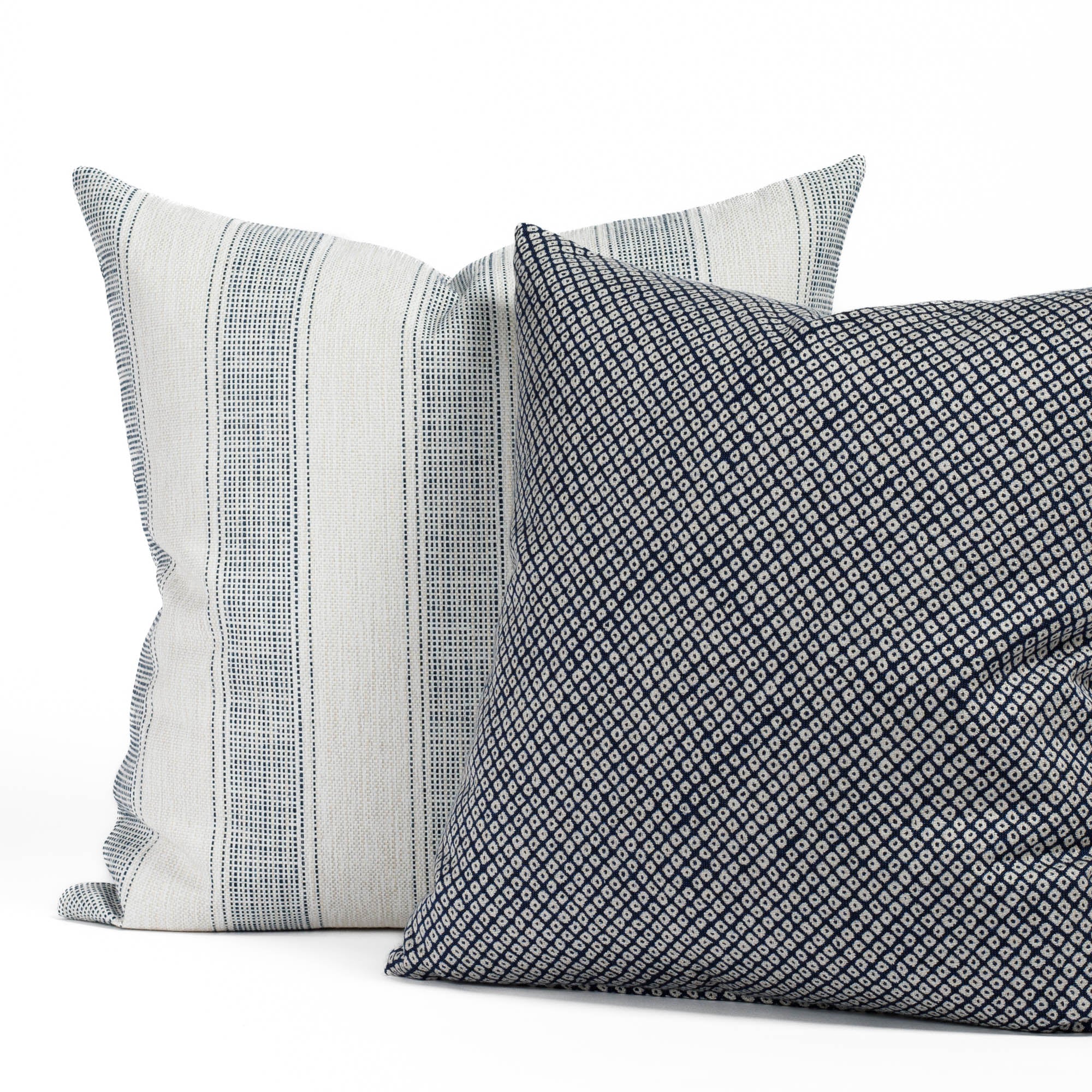 Revitalize Denim Blue 22x22 indoor/outdoor pillow paired with Shibori Indigo & White 20x20 indoor/outdoor pillow.