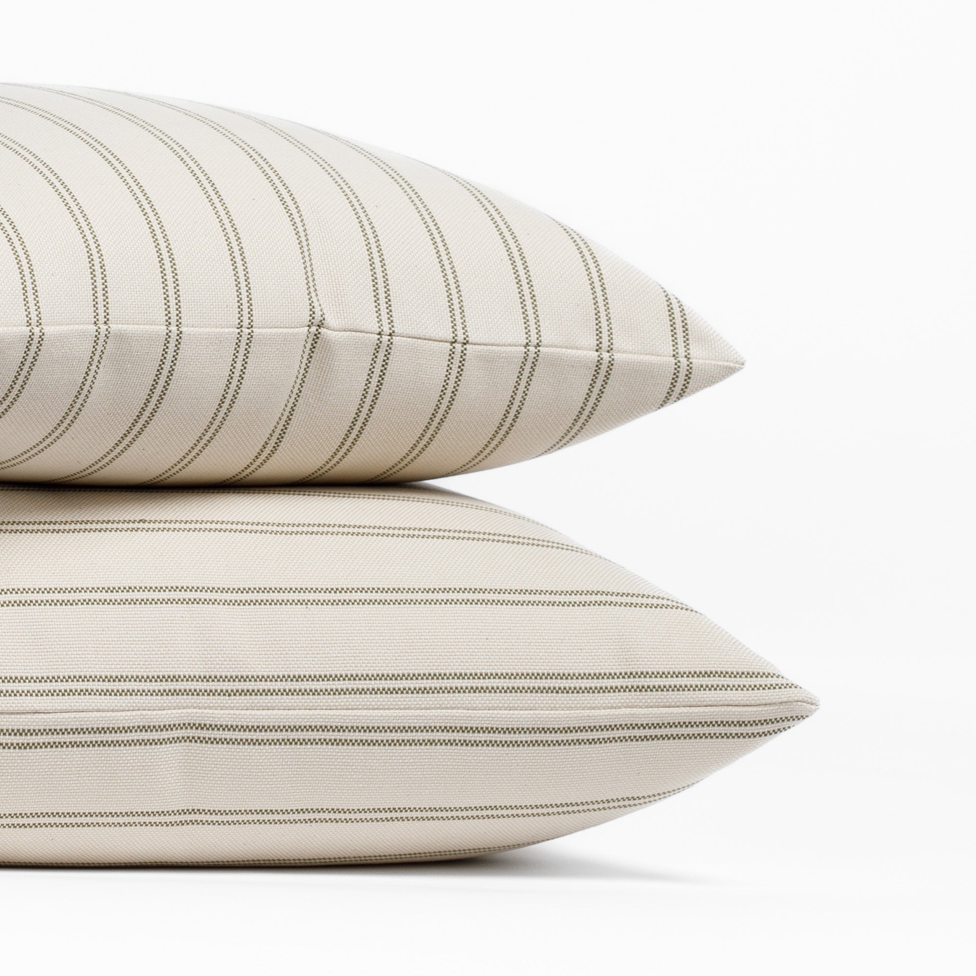 Stack of two Tonic Living Rexton Stripe Moss 24x24 decorative bed pillows in olive green and oatmeal stripes.