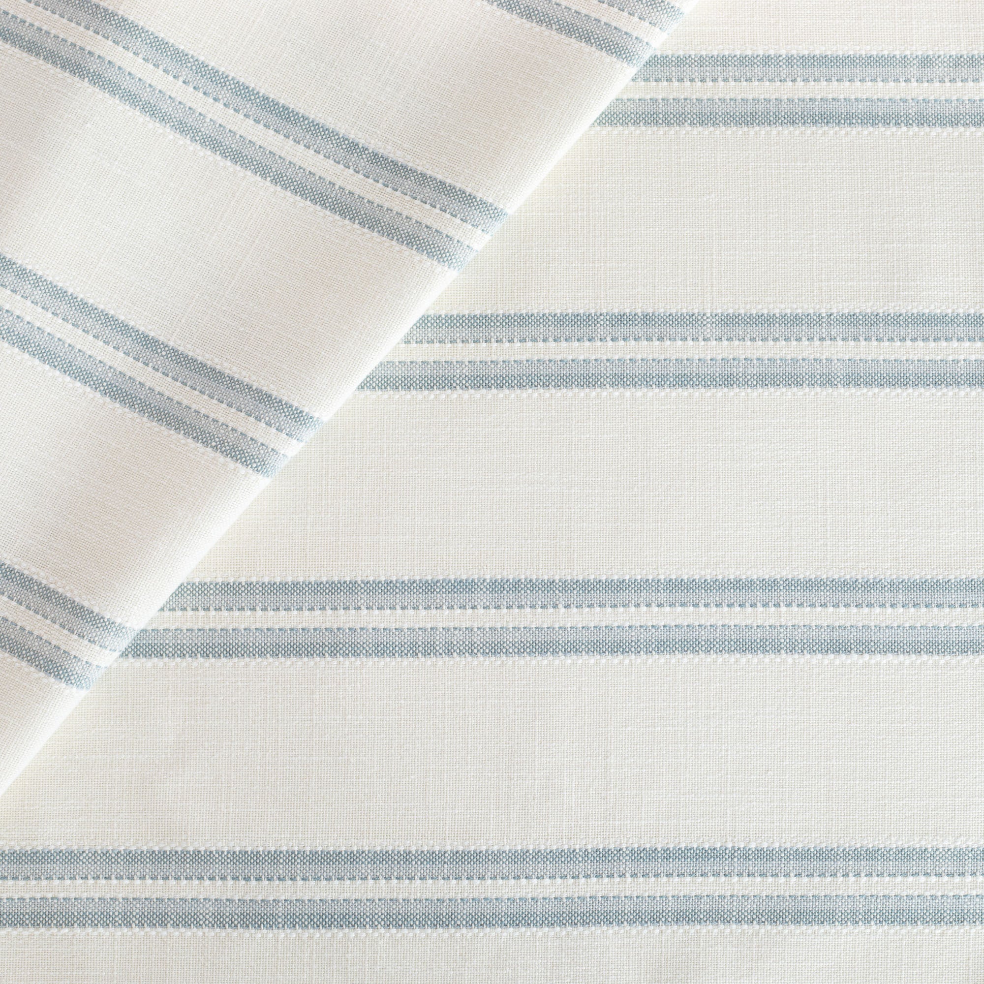 a white and chambray blue indoor outdoor Tonic Living fabric