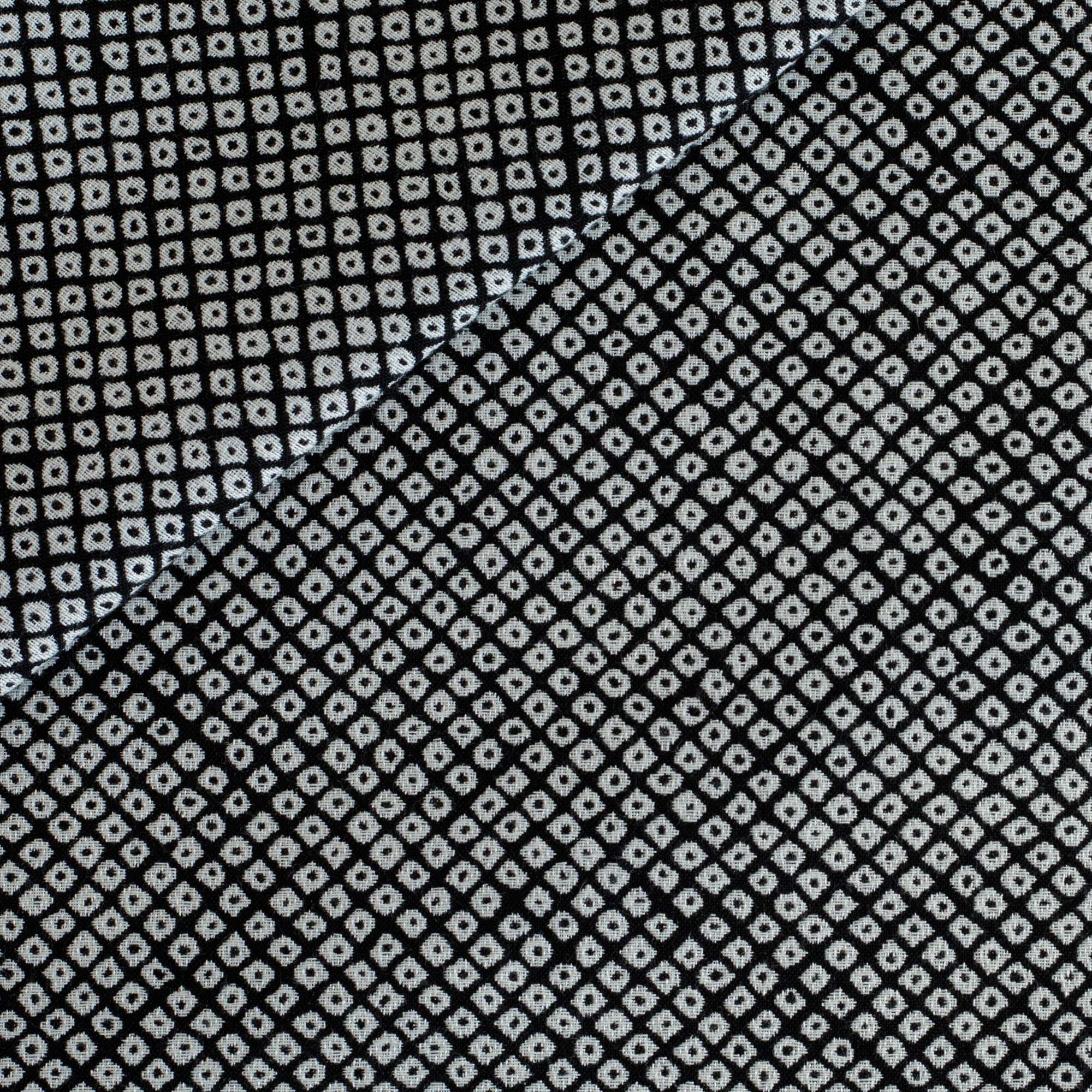 Shibori Classic Sunbrella Outdoor Fabric from Tonic Living, featuring a black and soft white Japanese-inspired geometric pattern.