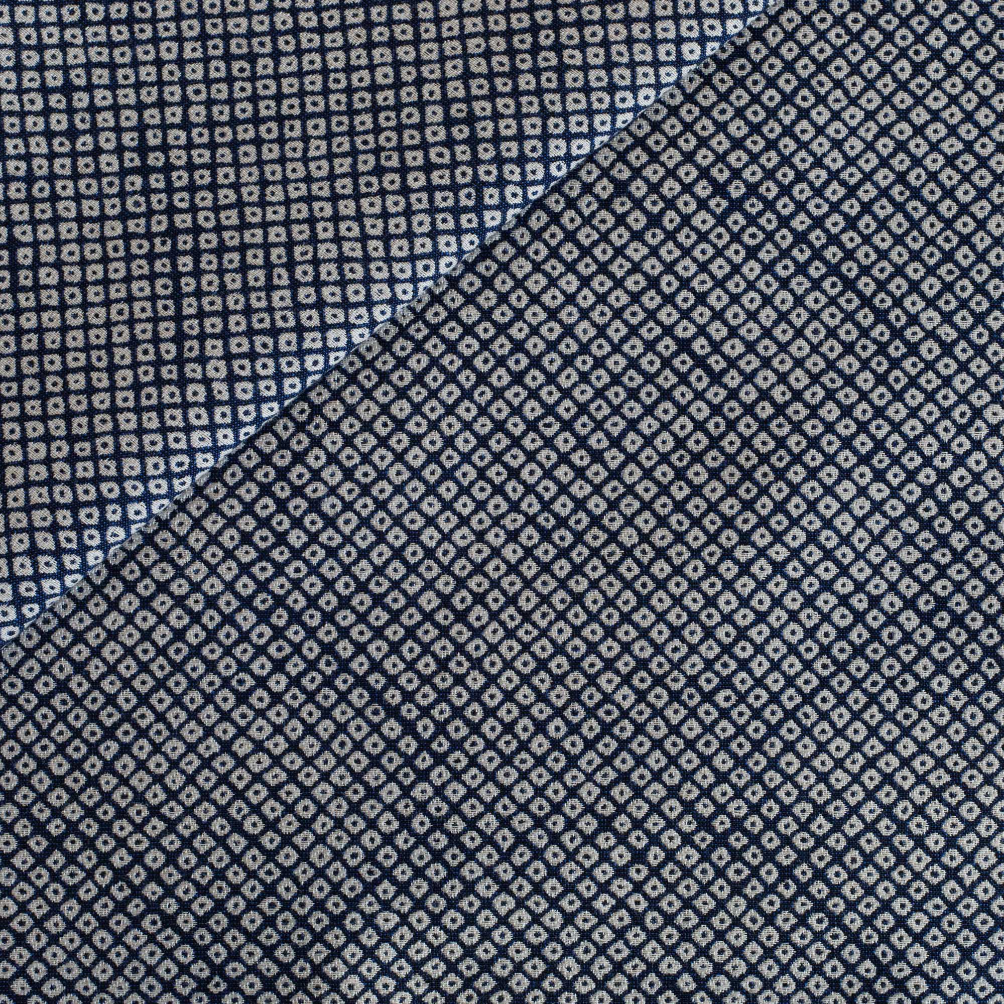 Shibori Indigo Sunbrella Outdoor Fabric from Tonic Living, featuring a navy blue and soft white Japanese-inspired geometric pattern.