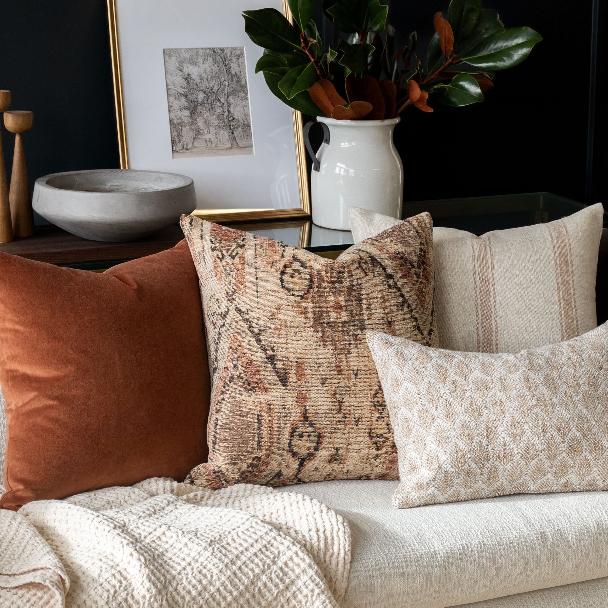 warm rust and earth tone decorative throw pillows from tonic living