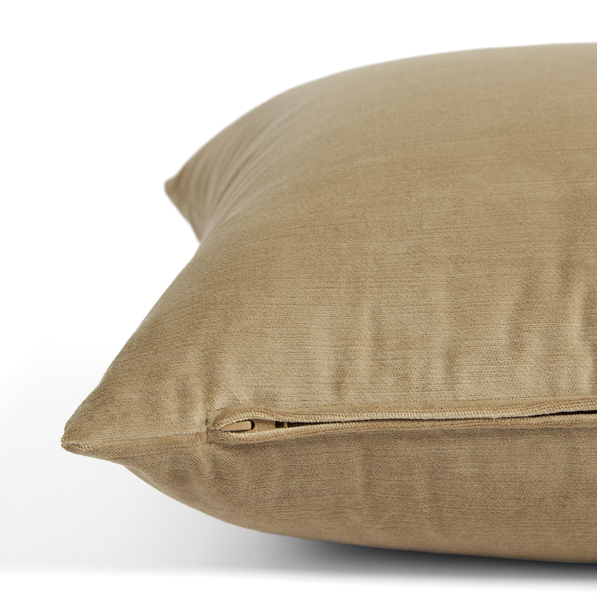 Side zipper detail of Tonic Living Sterling Velvet 20x20 pillow in soft tobacco brown velvet.