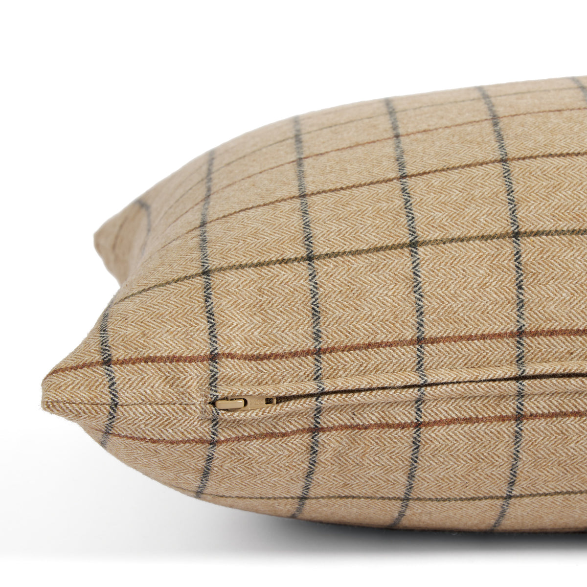 Side zipper detail of Tonic Living Walker Plaid 16x42 extra large lumbar pillow in a camel brown windowpane check.