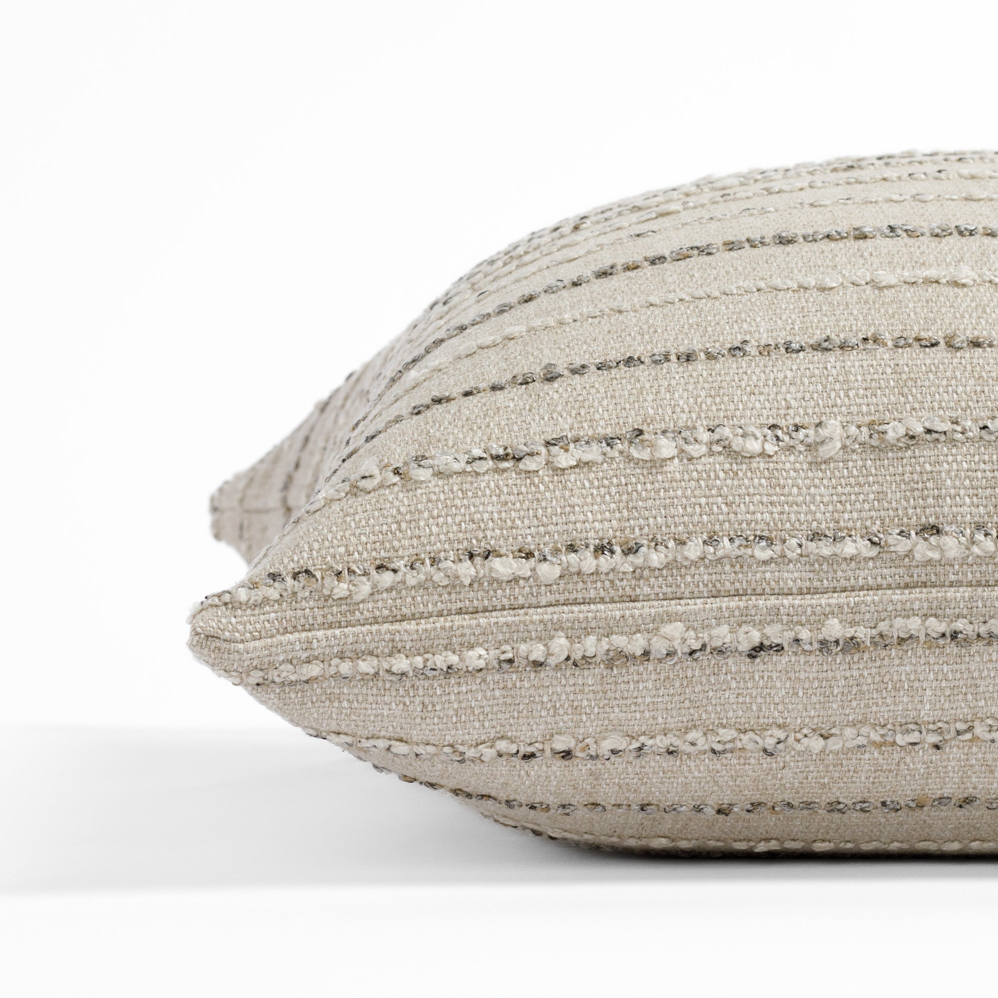 a neutral earth toned textured stripe : close up side view