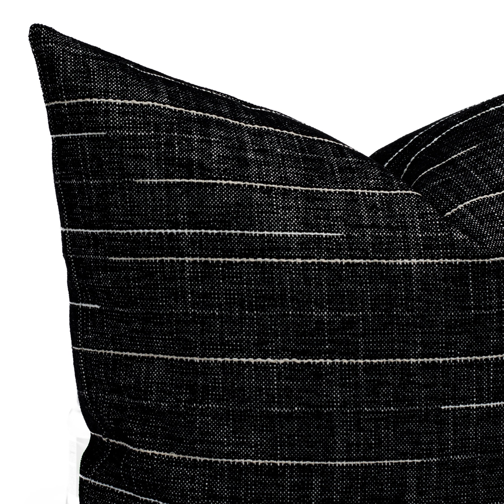 Yuzu Onyx 22x22, a black and white indoor/outdoor pillow from Tonic Living: close-up view.
