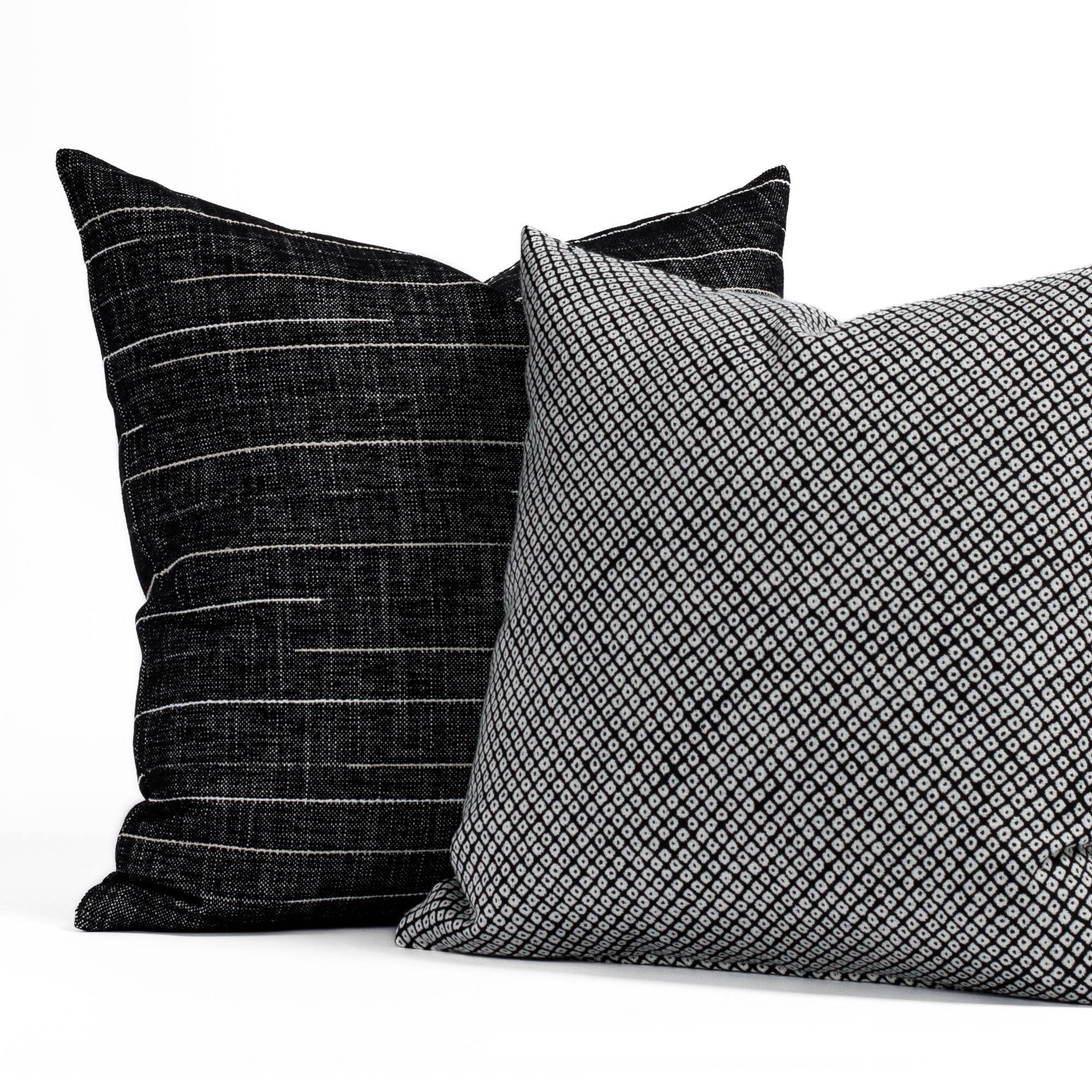 Black and white patterned indoor/outdoor throw pillows from Tonic Living.