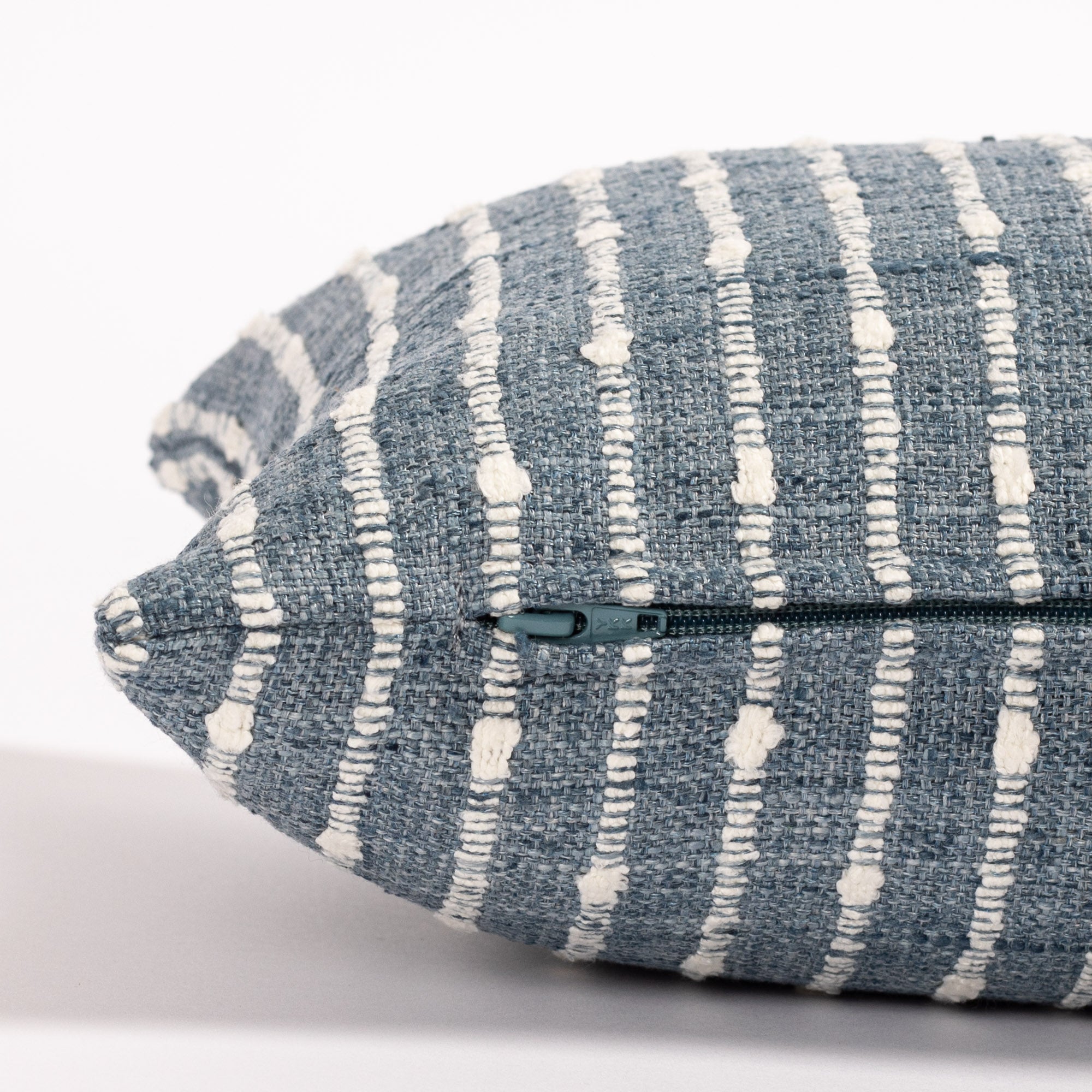 chambray blue and white stripe lumbar pillow : close up zipper view