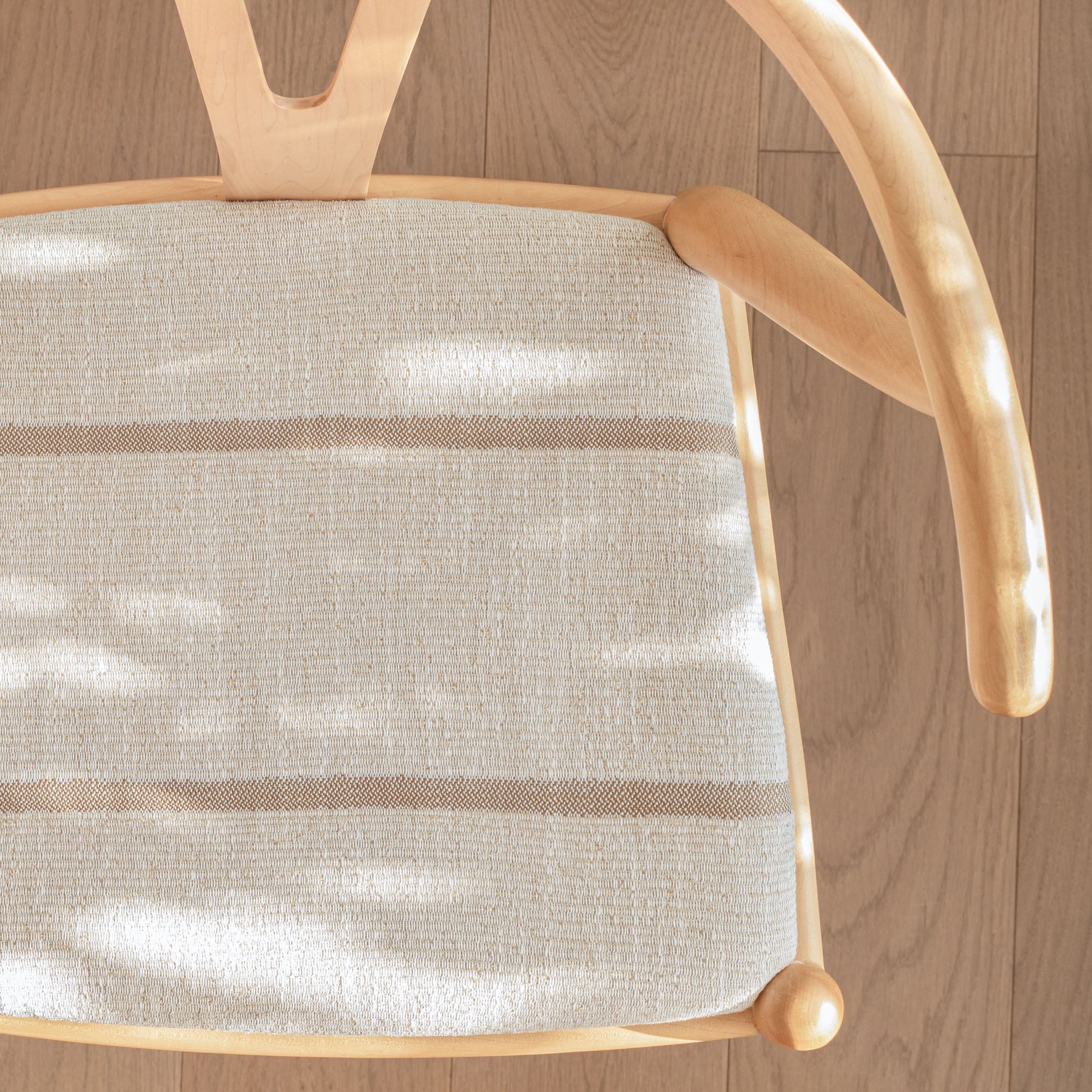 a beige and light brown stripe upholstered chair seat