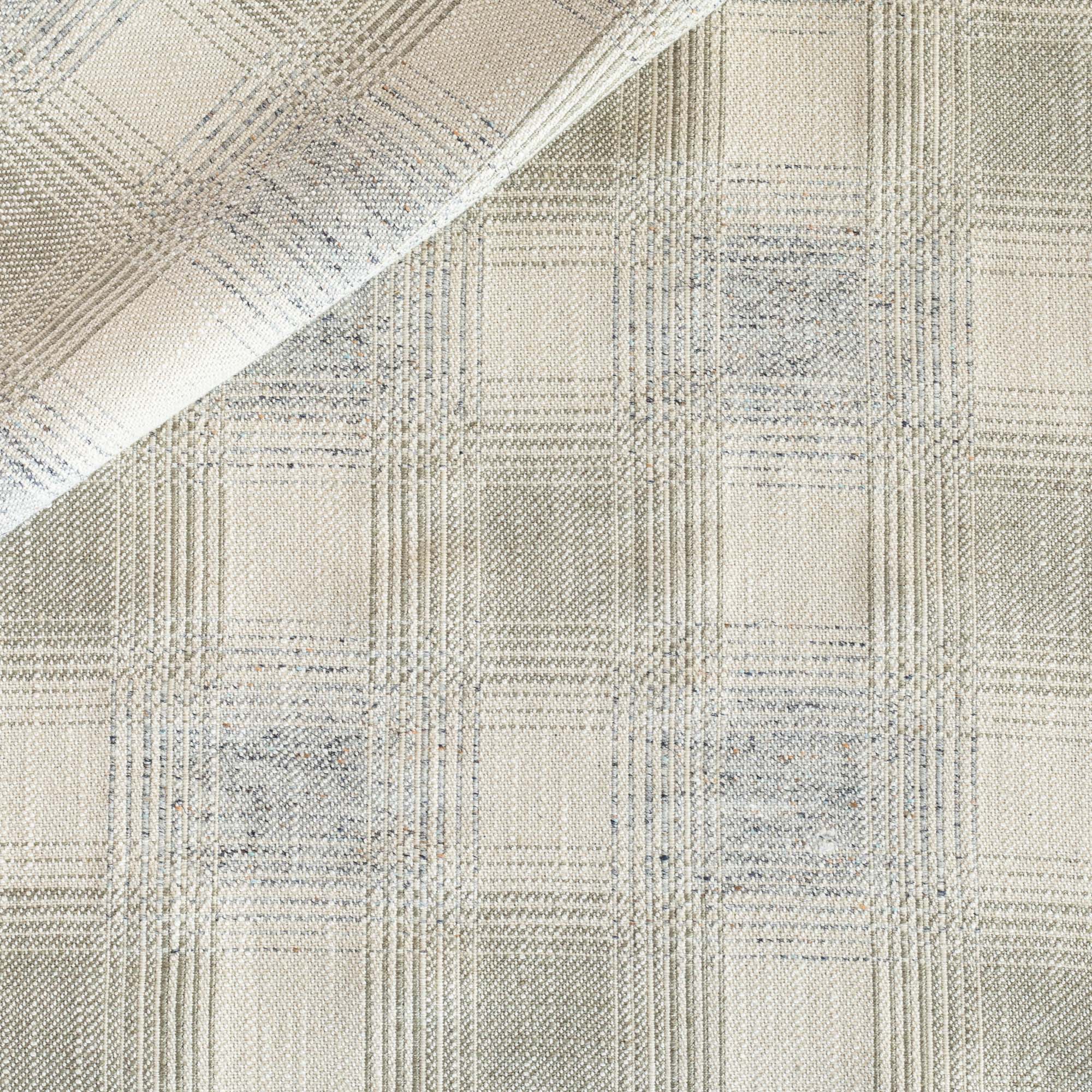 a light gray and denim blue plaid Tonic Living upholstery fabric