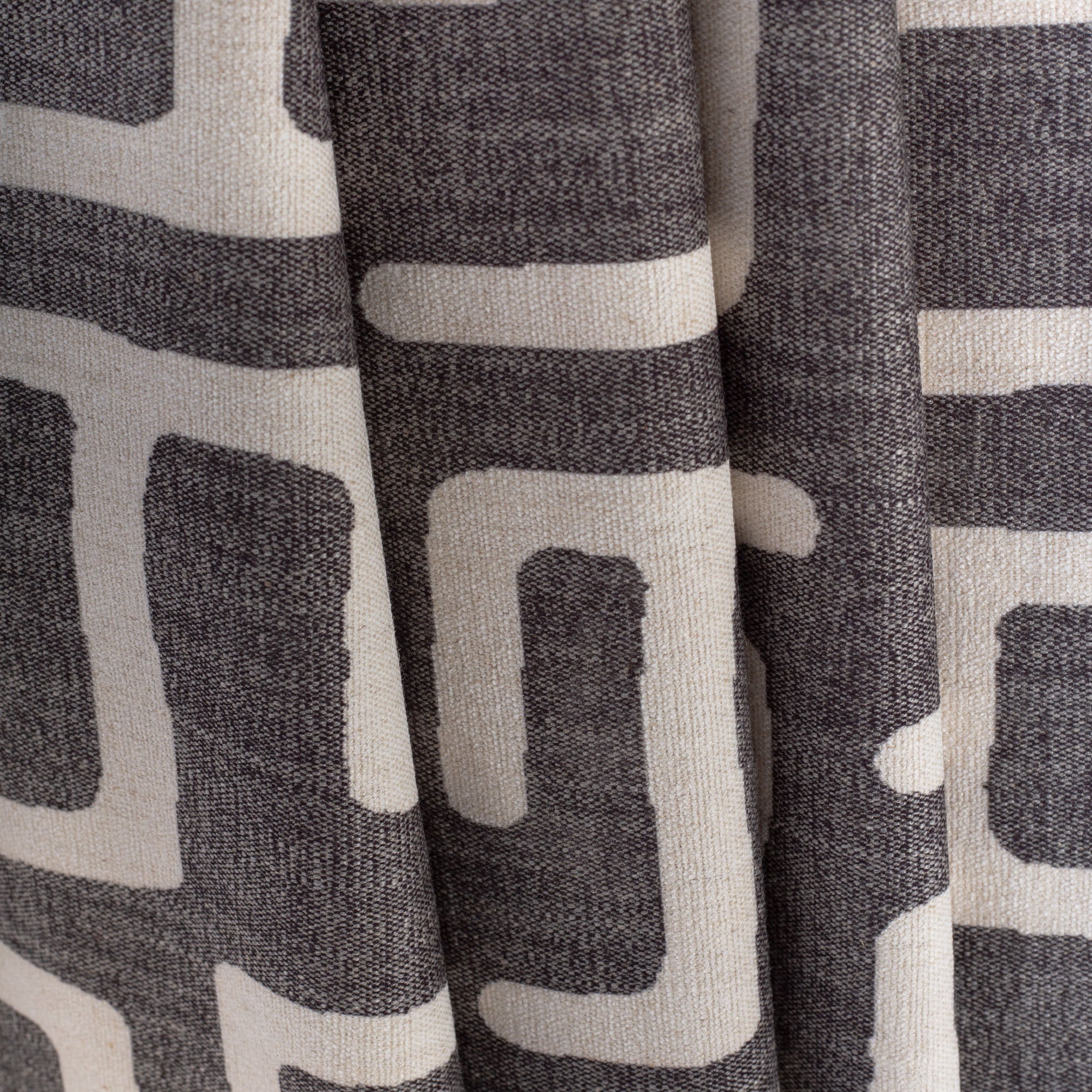 dark grey and beige kuba inspired print fabric