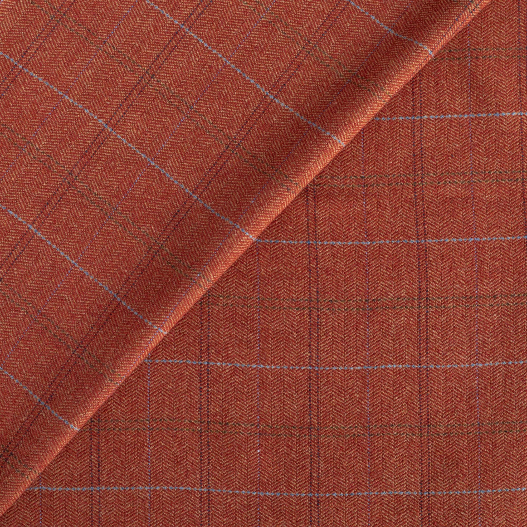 Lundie Plaid Cayenne, a rust red, wool blend plaid home decor fabric from Tonic Living