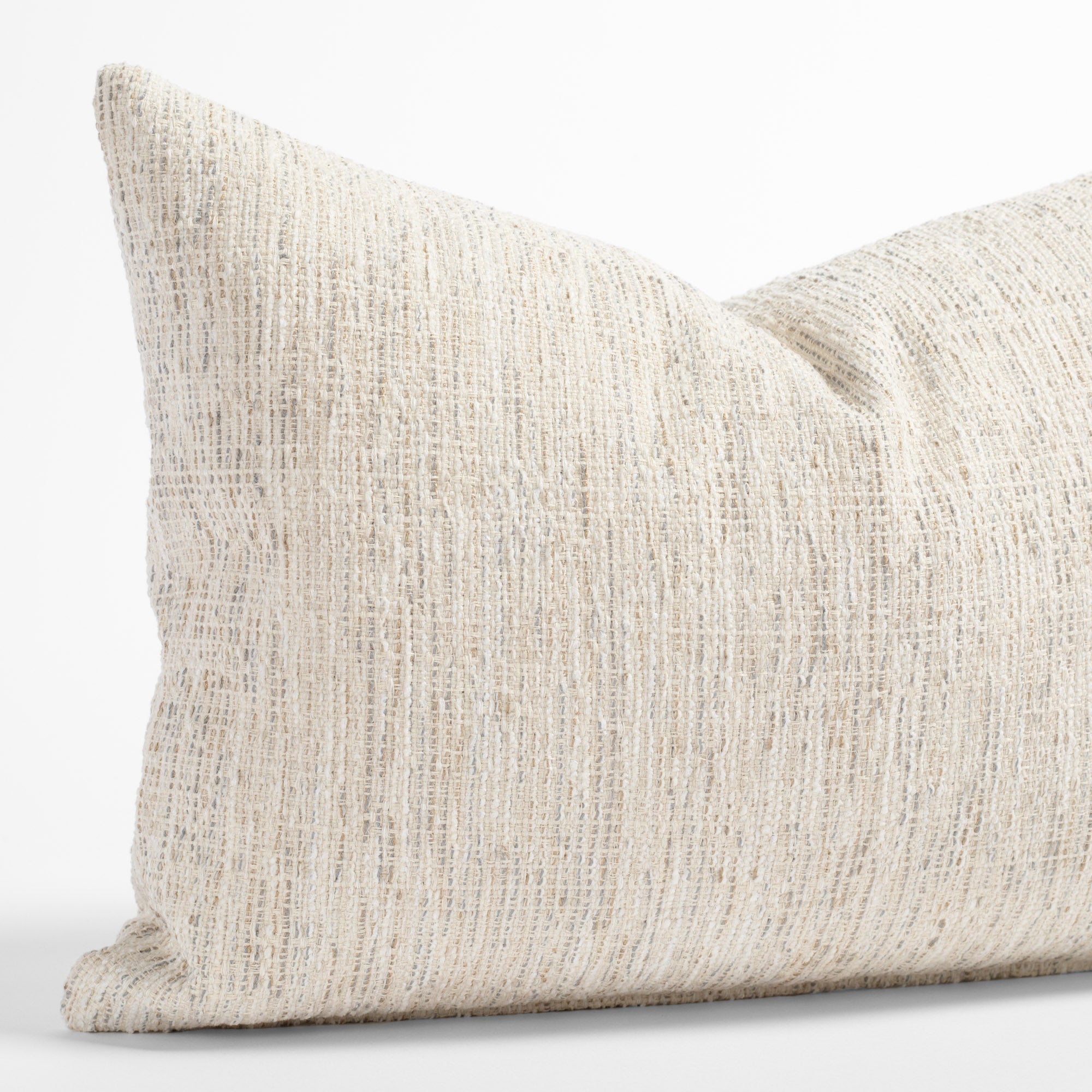 a cream lumbar throw pillow