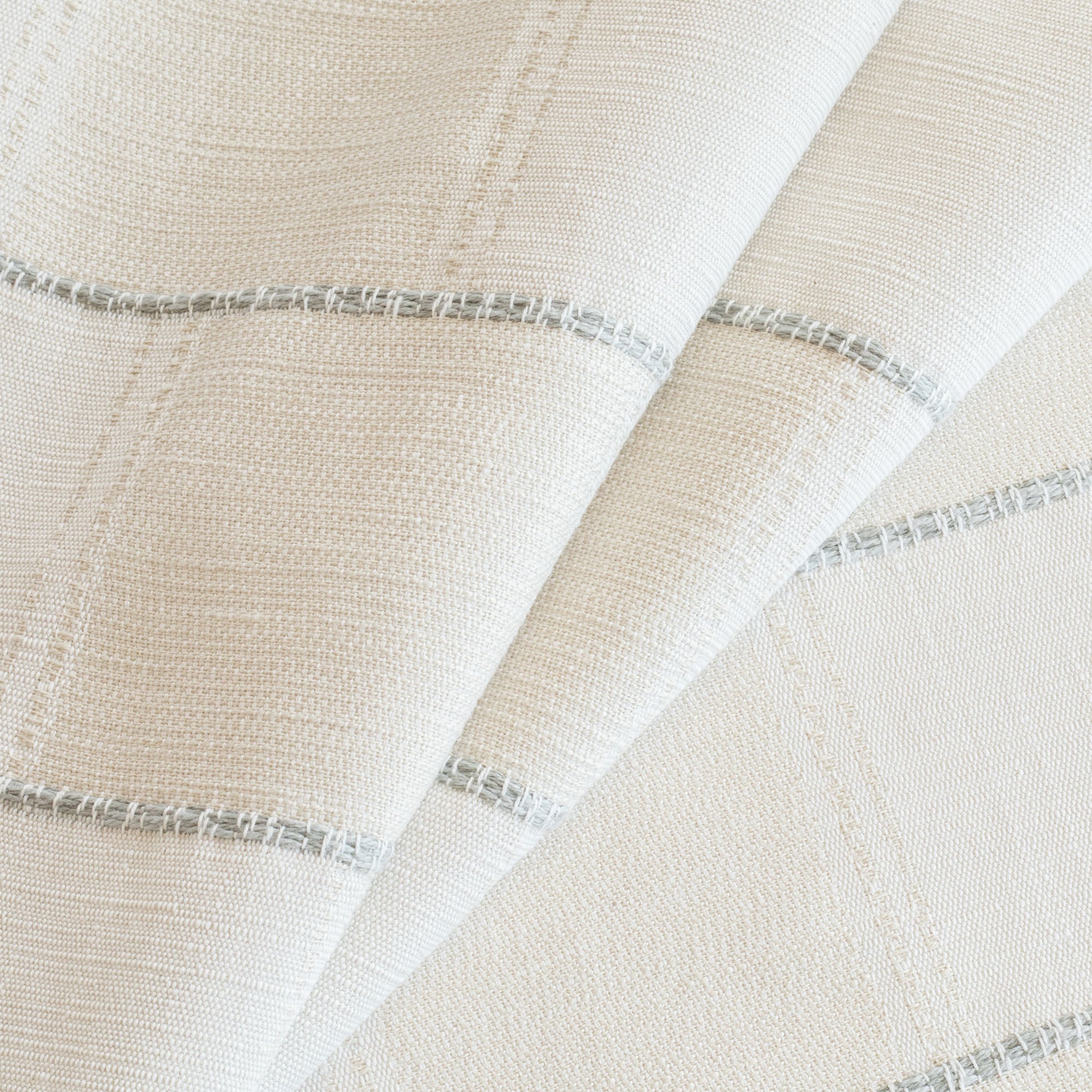 a cream and white check with a chunky light blue horizontal stripe upholstery fabric