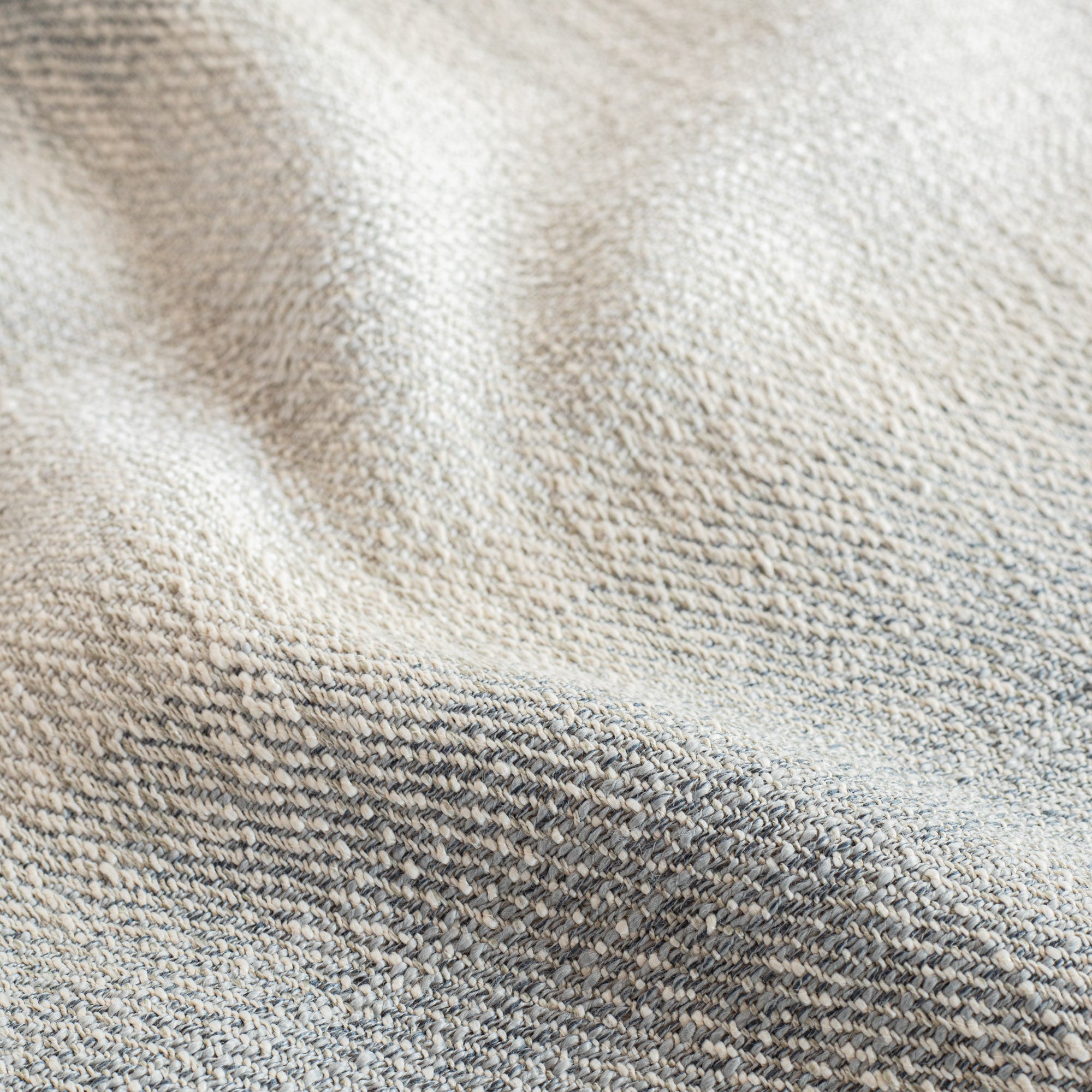 a denim blue and sandy gray ombre stripe home decor fabric