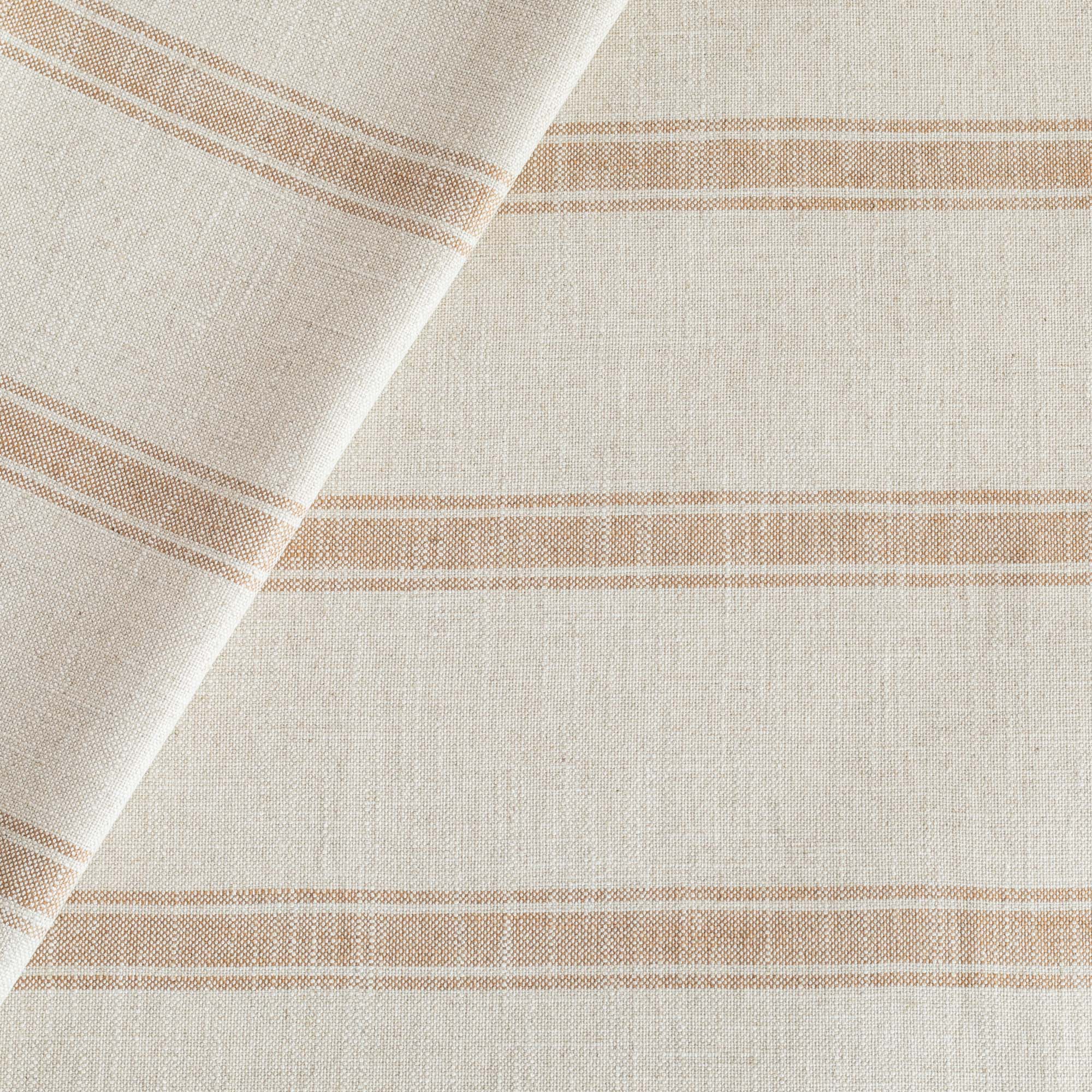 a faded rust and oatmeal cream striped upholstery fabric from Tonic Living