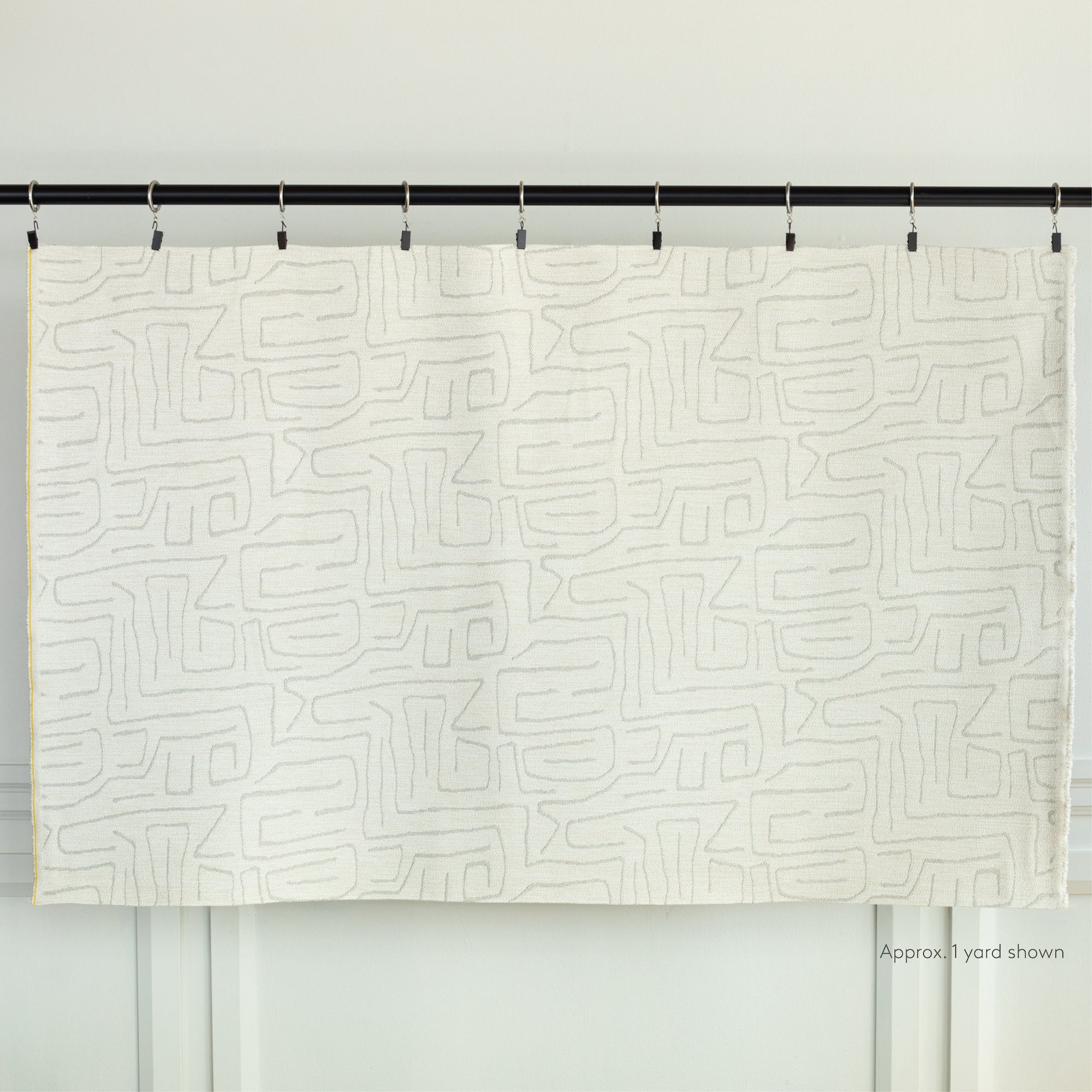 an off-white and light gray abstract line pattern upholstery fabric by the yard from Tonic Living