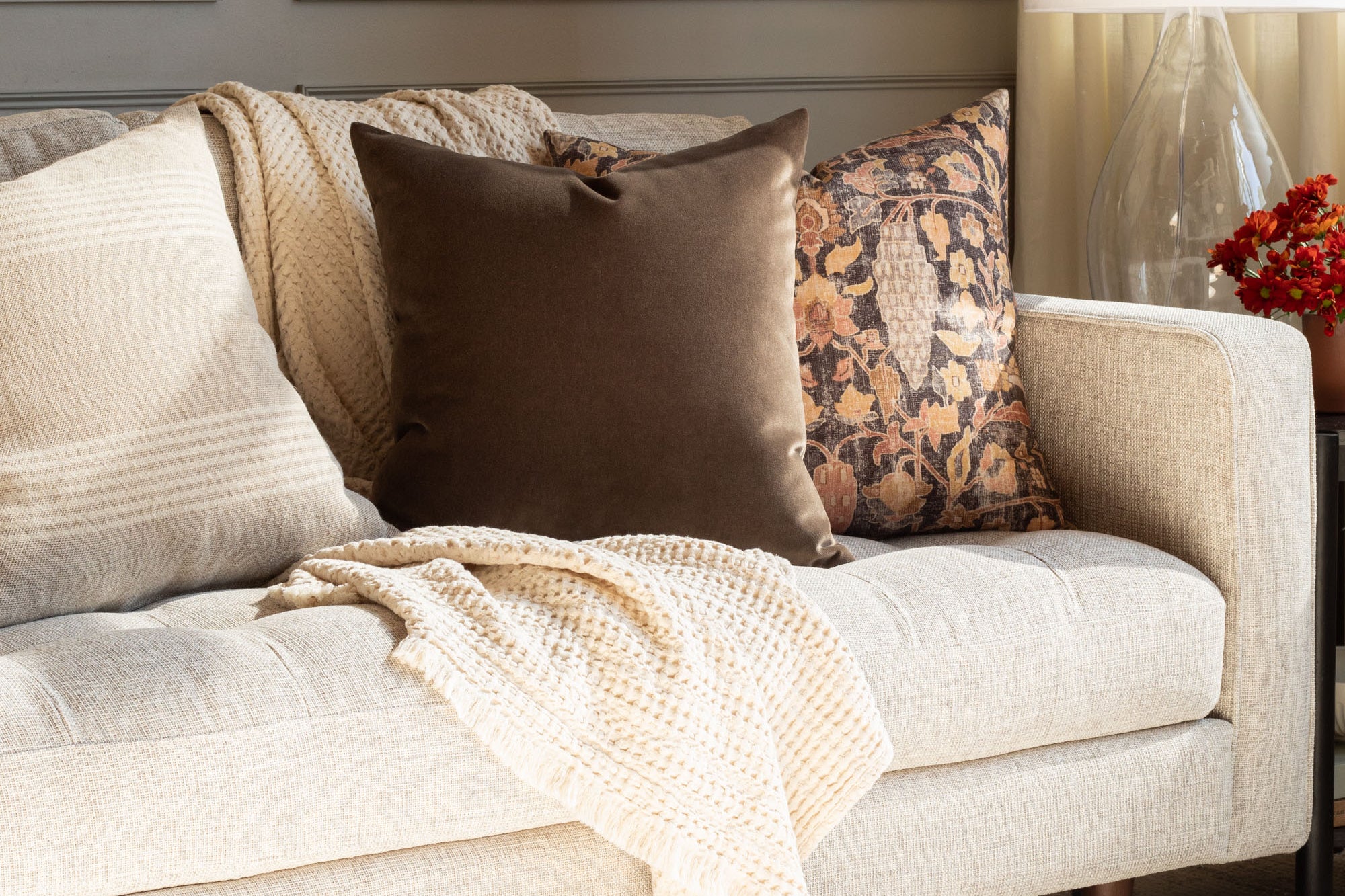 deep brown valentina velvet truffle pillows on a neutral grey couch - fall living room scene by Tonic Living
