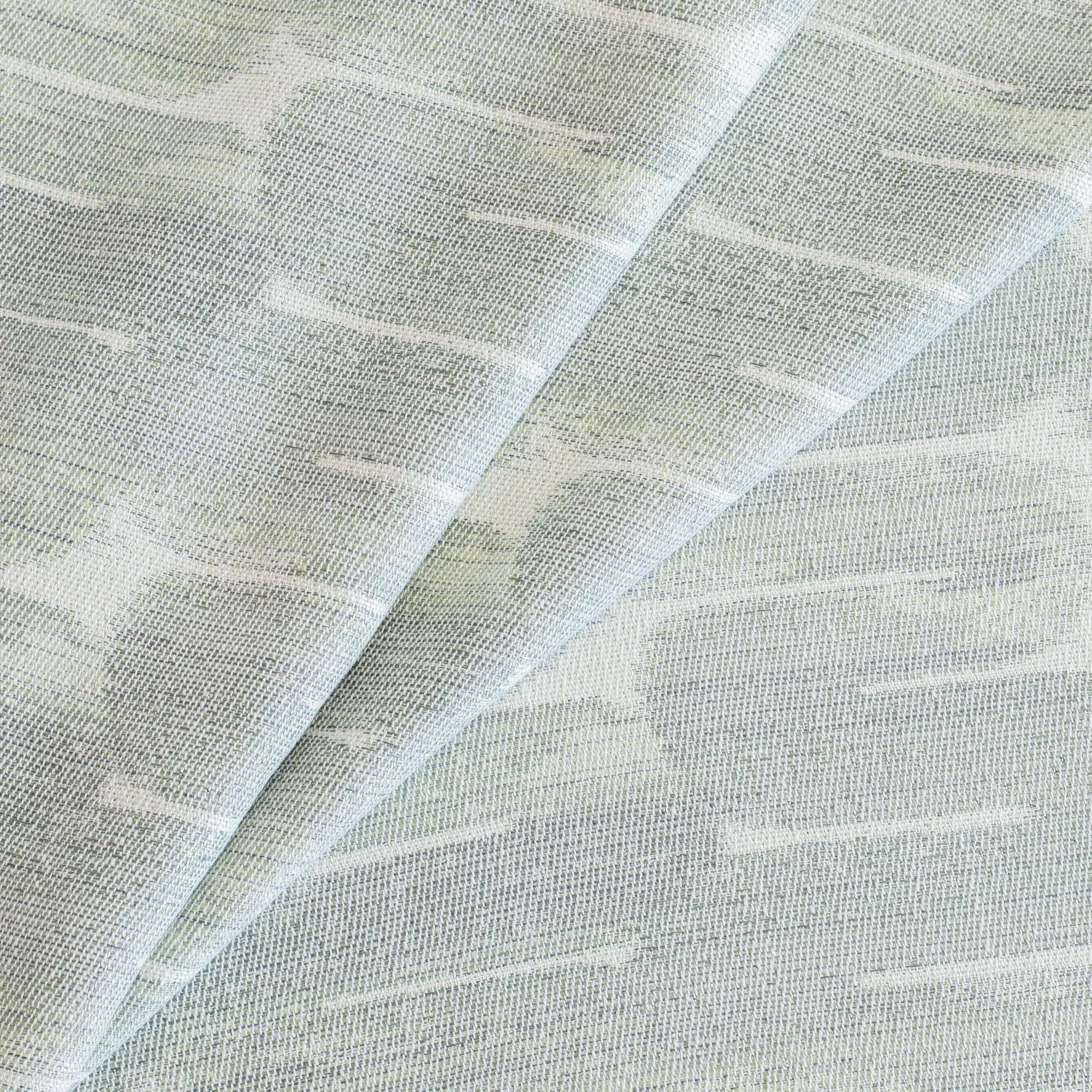 a watery blue, jade green and white swirl designer tonic living fabric