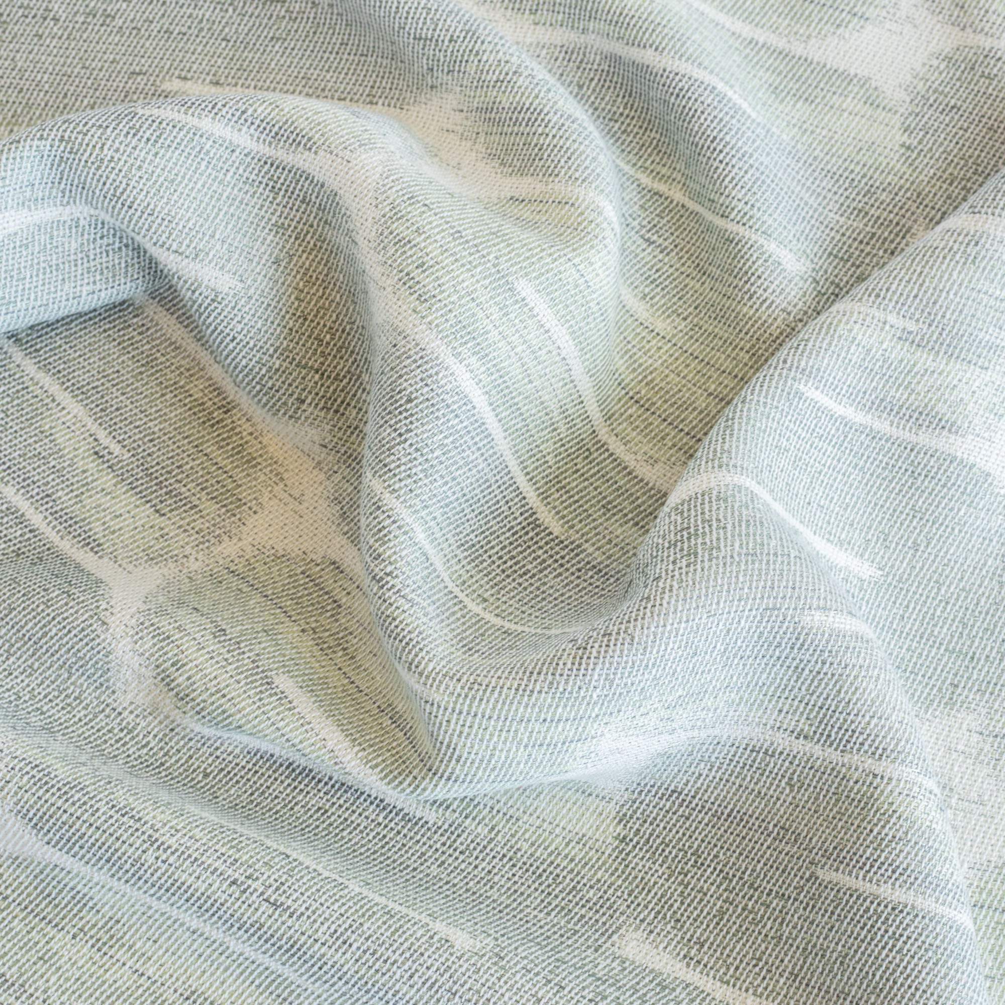 a watery blue, jade green pattern designer tonic living fabric