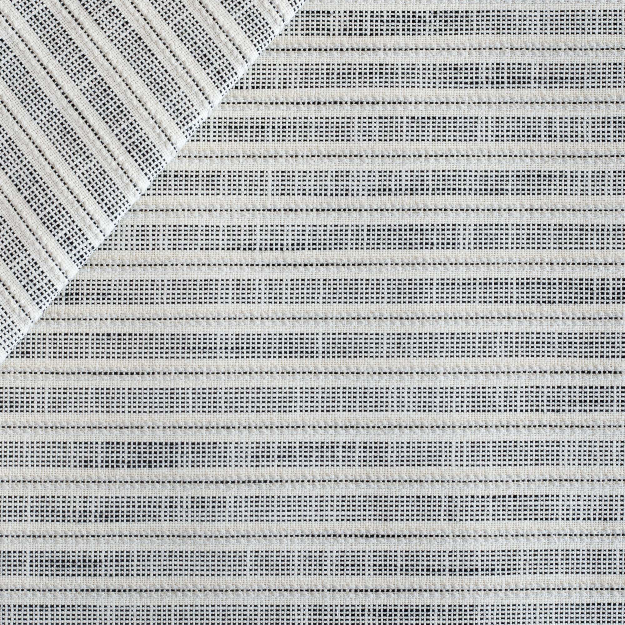 a white and black stripe Inside Out upholstery fabric