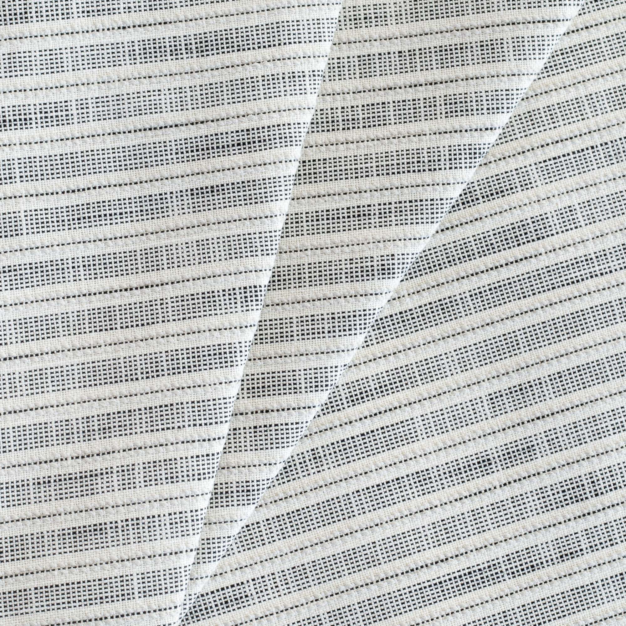Amalfi InsideOut Fabric Domino, a white and black ticking stripe outdoor upholstery fabric from Tonic Living
