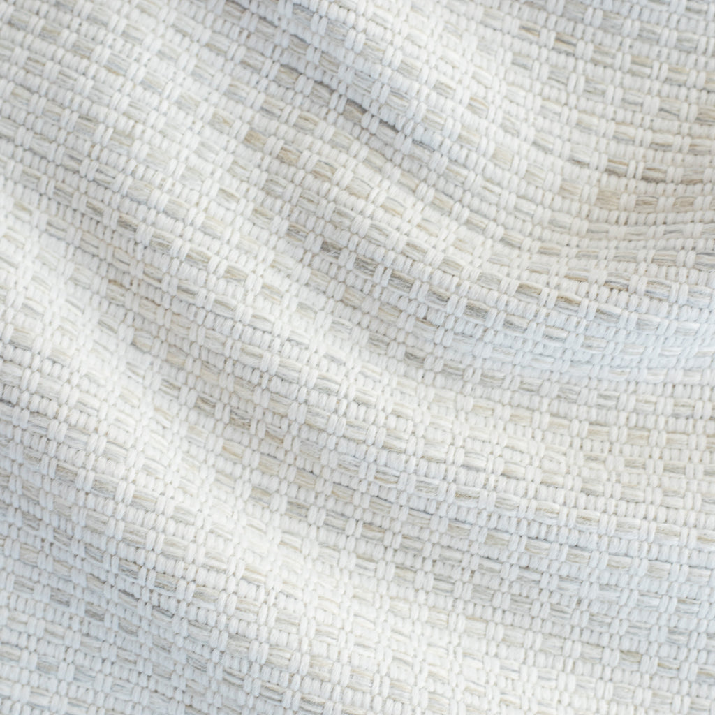 Arlo Fabric Pebble, a white, oatmeal and gray basket weave textured stain resistant upholstery fabric from Tonic Living