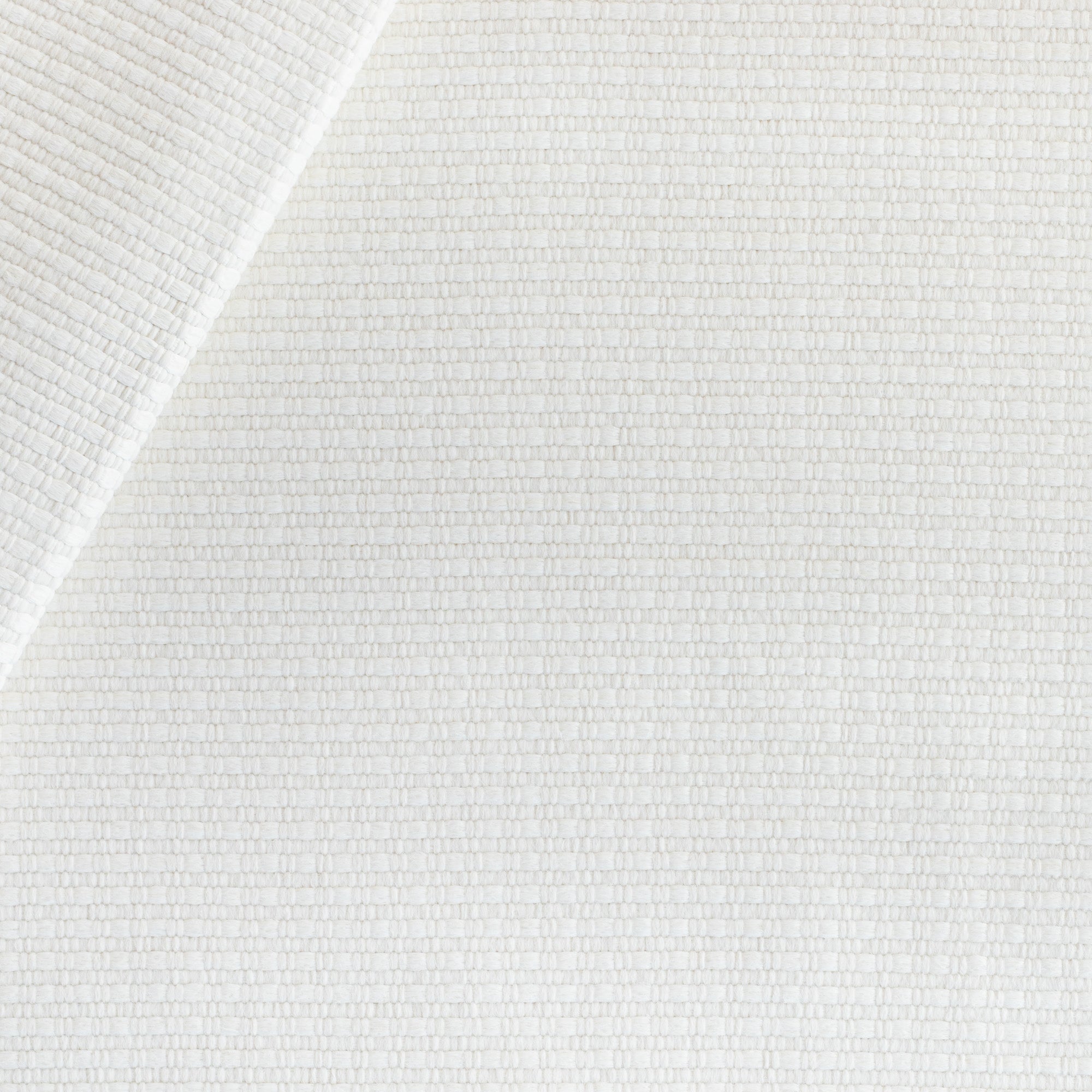 a white basket weave textured home decor fabric