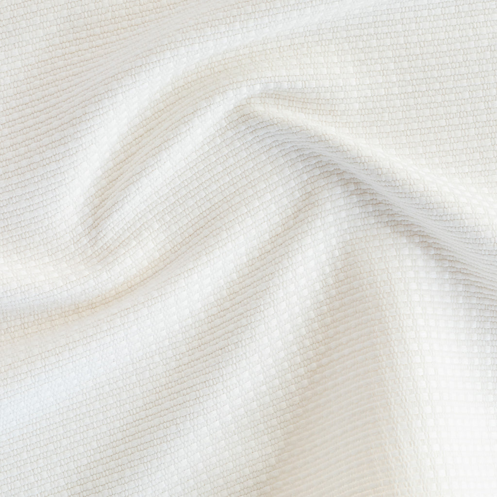 a white basket weave textured high performance upholstery fabric
