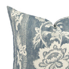 Close up of Tonic Living Ashford cushion showing scrolling floral vine detail in chambray blue and white.
