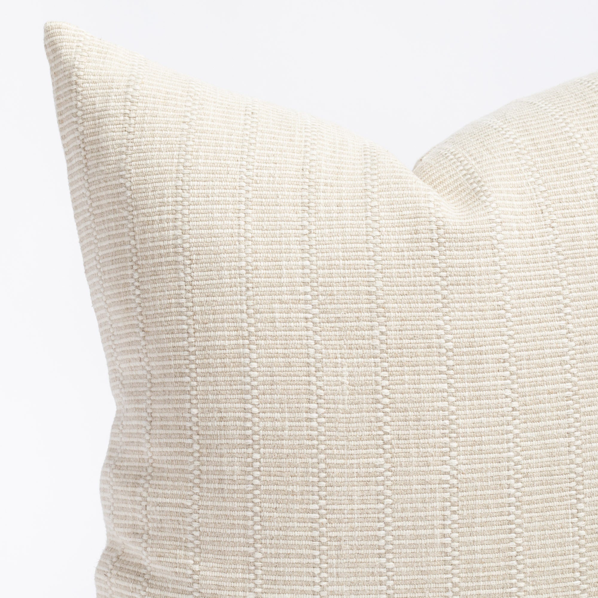 a cream tone-on-tone textured stripe throw pillow : close up view