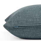 Zipper detail of Bedford Denim toss pillow, Tonic Living chenille fabric in chambray blue tone.