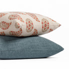 Stacked Tonic Living pillows: Bedford Denim blue pillow with Grace Rosewood paisley pillow.