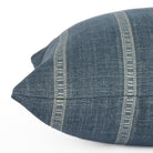 Side view of Brunswick Stripe 14x20 Lumbar Pillow, Chambray by Tonic Living — decorative cushion with fine chenille stripes in chambray blue and white.