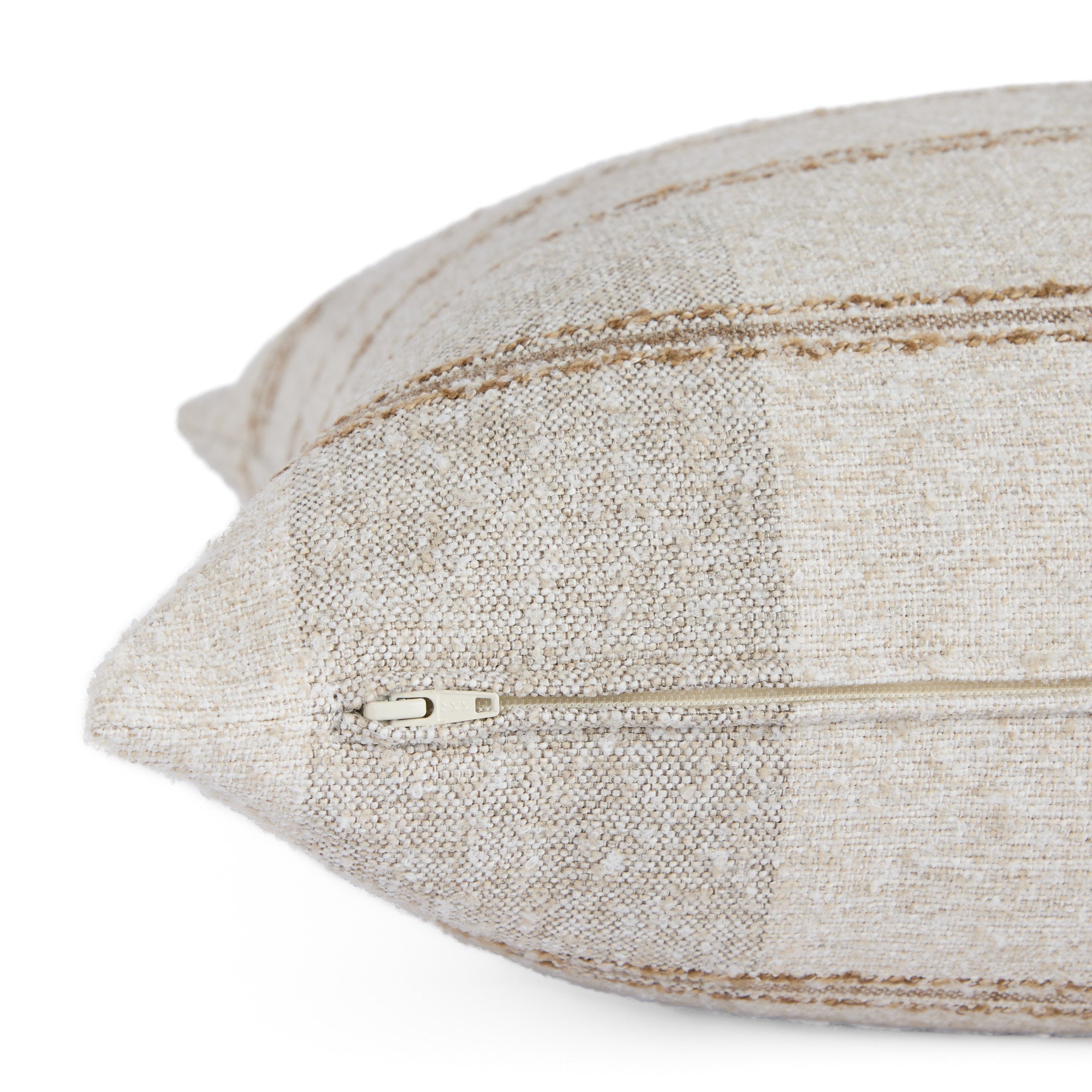 Detail of Buckley Wheat 22x22 pillow showing side zipper and textured plaid fabric – Tonic Living
