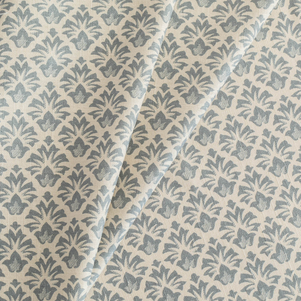 Calli Fabric Indigo, a earthy blue and sandy cream floral block print drapery fabric from Tonic Living