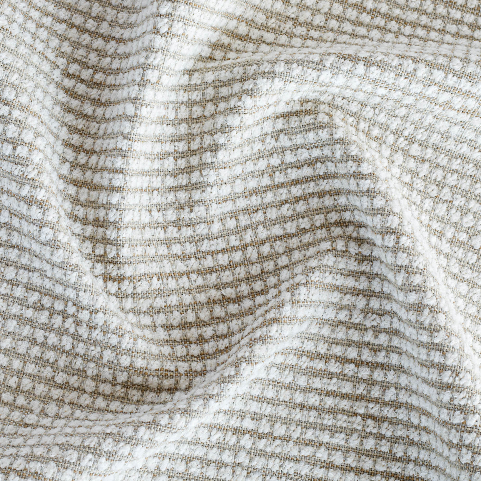a greige and white nubby textured high performance upholstery fabric