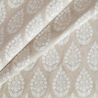 Chandra Beige Bisque, a white and sandy oatmeal floral block print fabric from Tonic Living