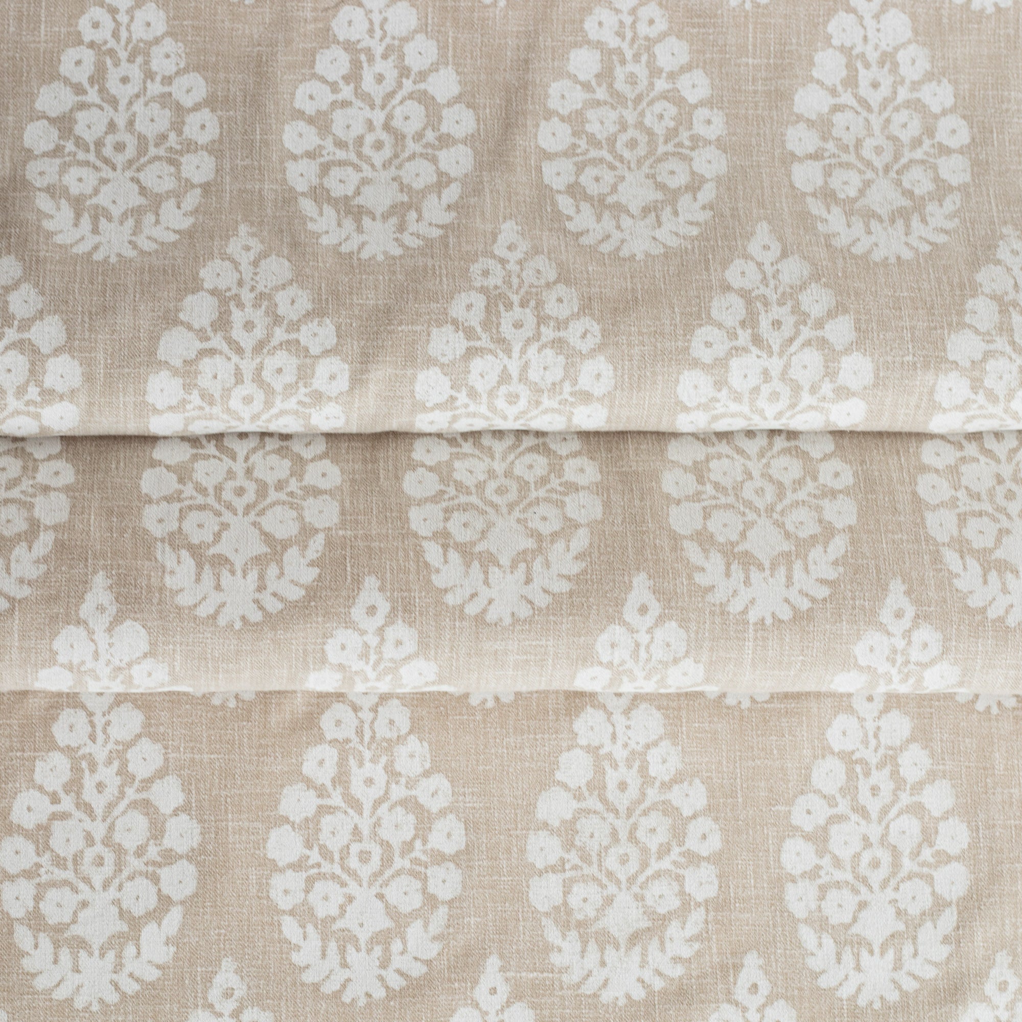 Chandra Beige Bisque, a white and sandy oatmeal floral block print fabric from Tonic Living