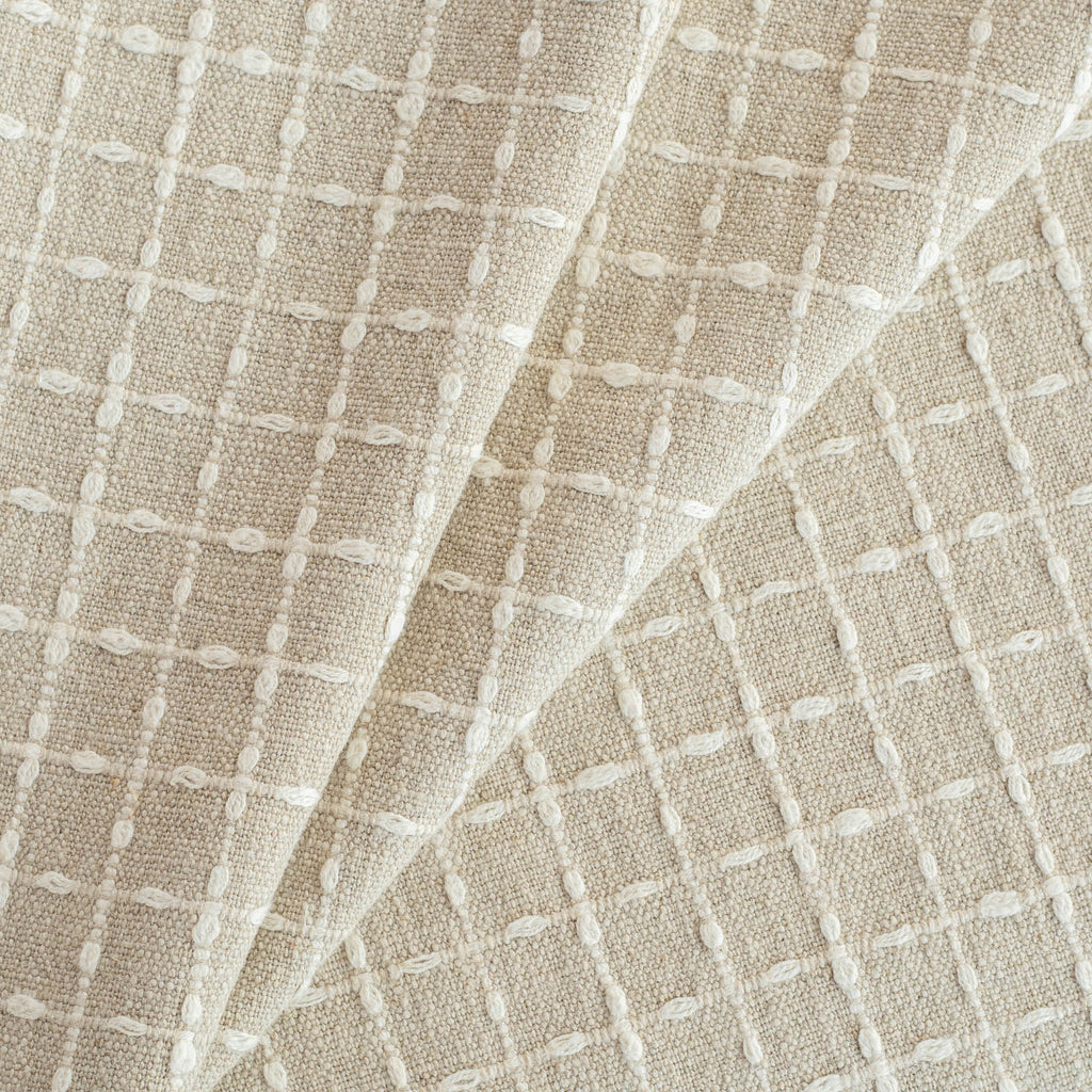 Chase Fabric Natural, a beige linen blend fabric with cream windowpane stitch pattern from Tonic Living