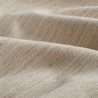 Close-up of Chester Fabric, Flax by Tonic Living — soft neutral herringbone weave with multi-tonal texture.