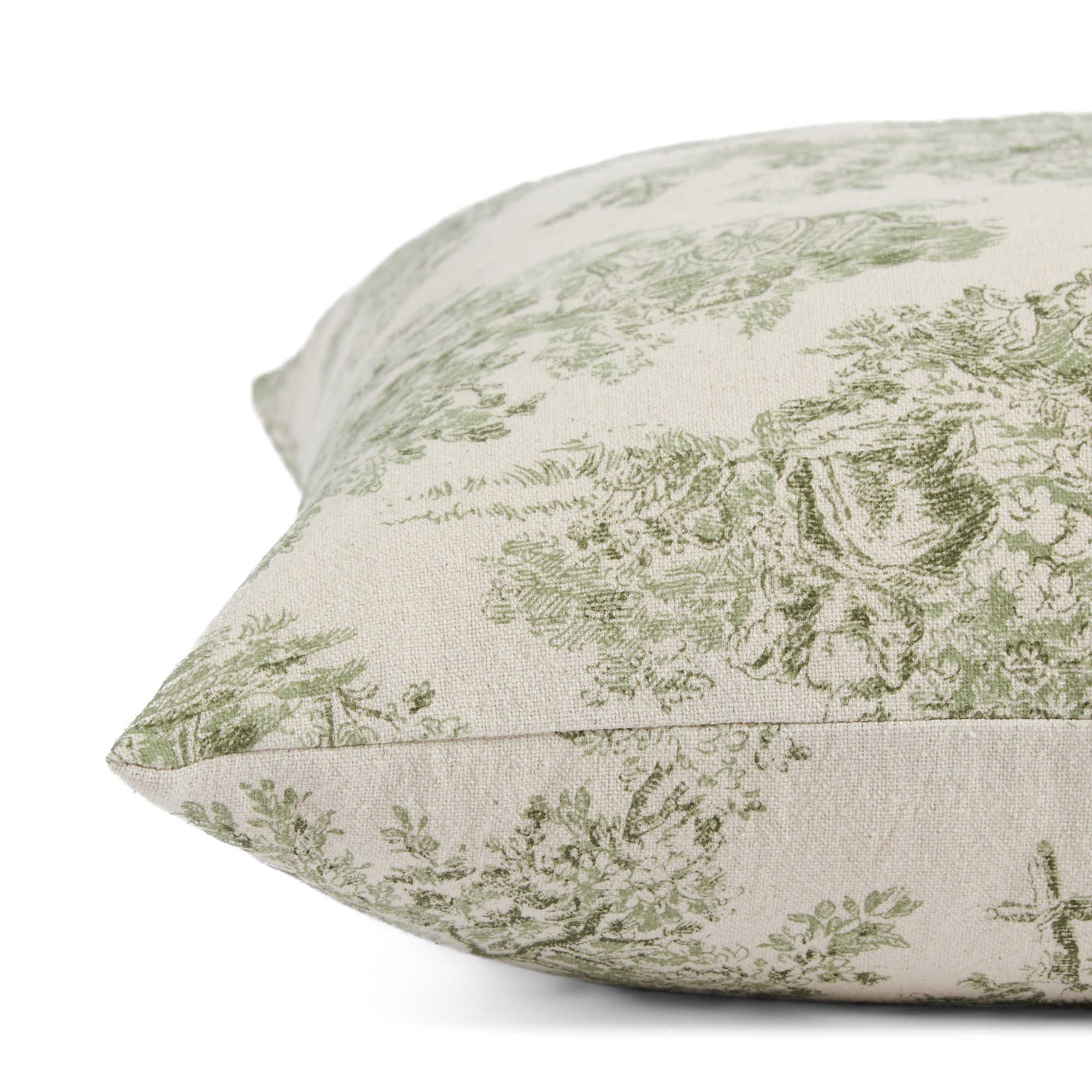 Side view of Tonic Living Colette Forest Green pillow highlighting its French toile pastoral pattern.