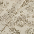 Tonic Living Colette Portobello drapery fabric with softly faded pastoral scenes in brown and natural tones.