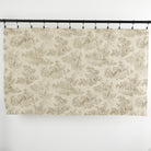 Full yard of Tonic Living Colette Portobello fabric showing scenic pastoral toile design in brown and natural tones.