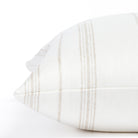 a flax beige and white vertical stripe throw pillow : side detail