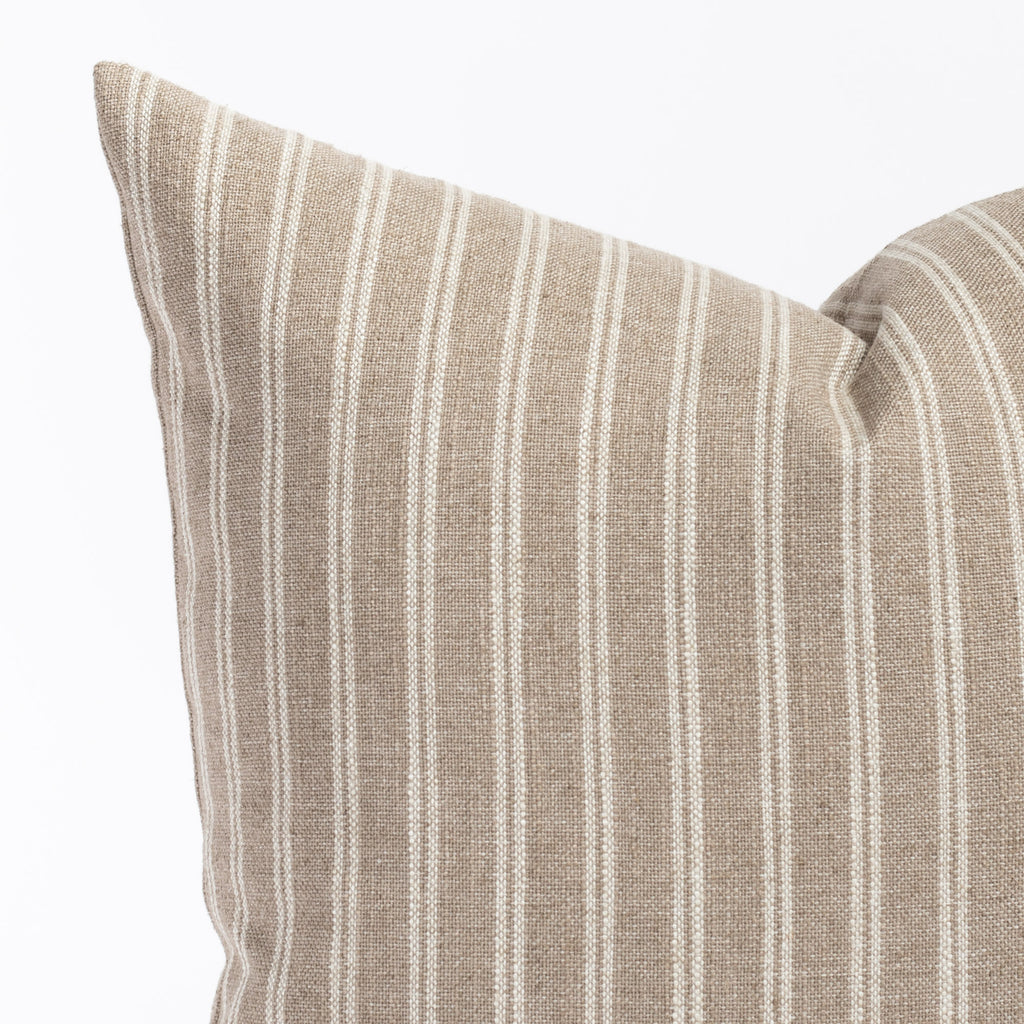a light brown and oatmeal beige vertical stripe throw pillow : close up view