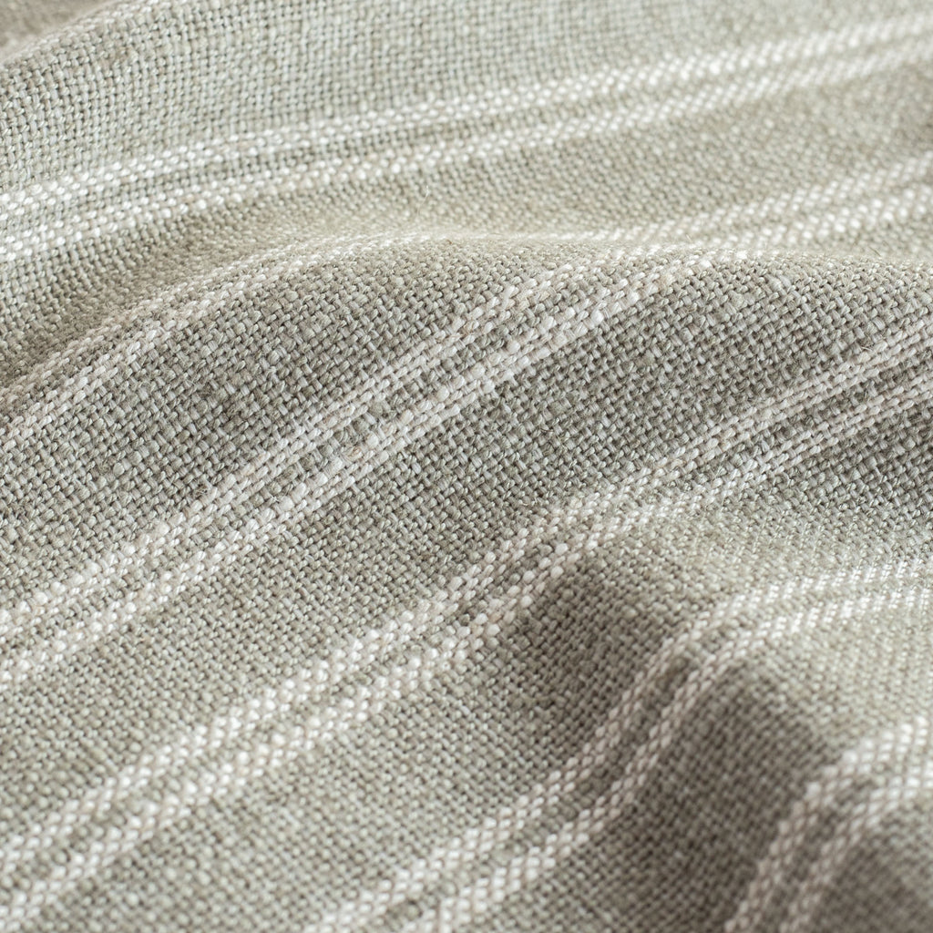 a sage green and cream horizontal stripe home decor fabric